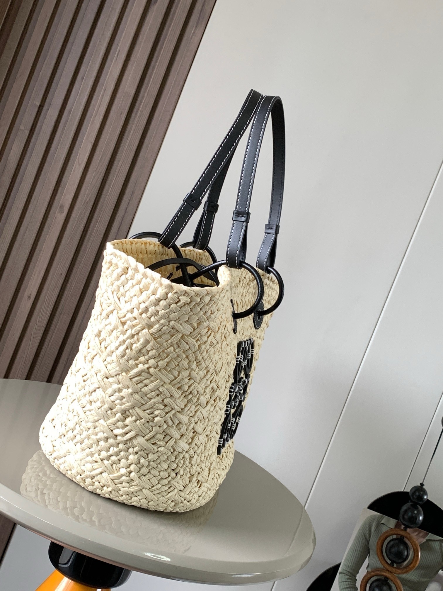 L0ew* medium anagram basket bag in iraca palm and black calfskin