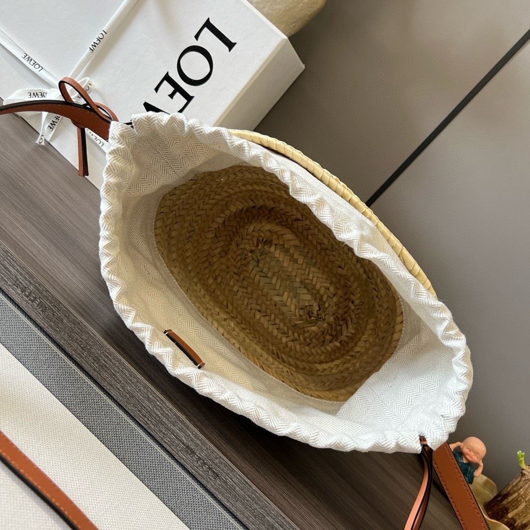 L0ew* drawstring bucket bag in palm leaf and brown calfskin