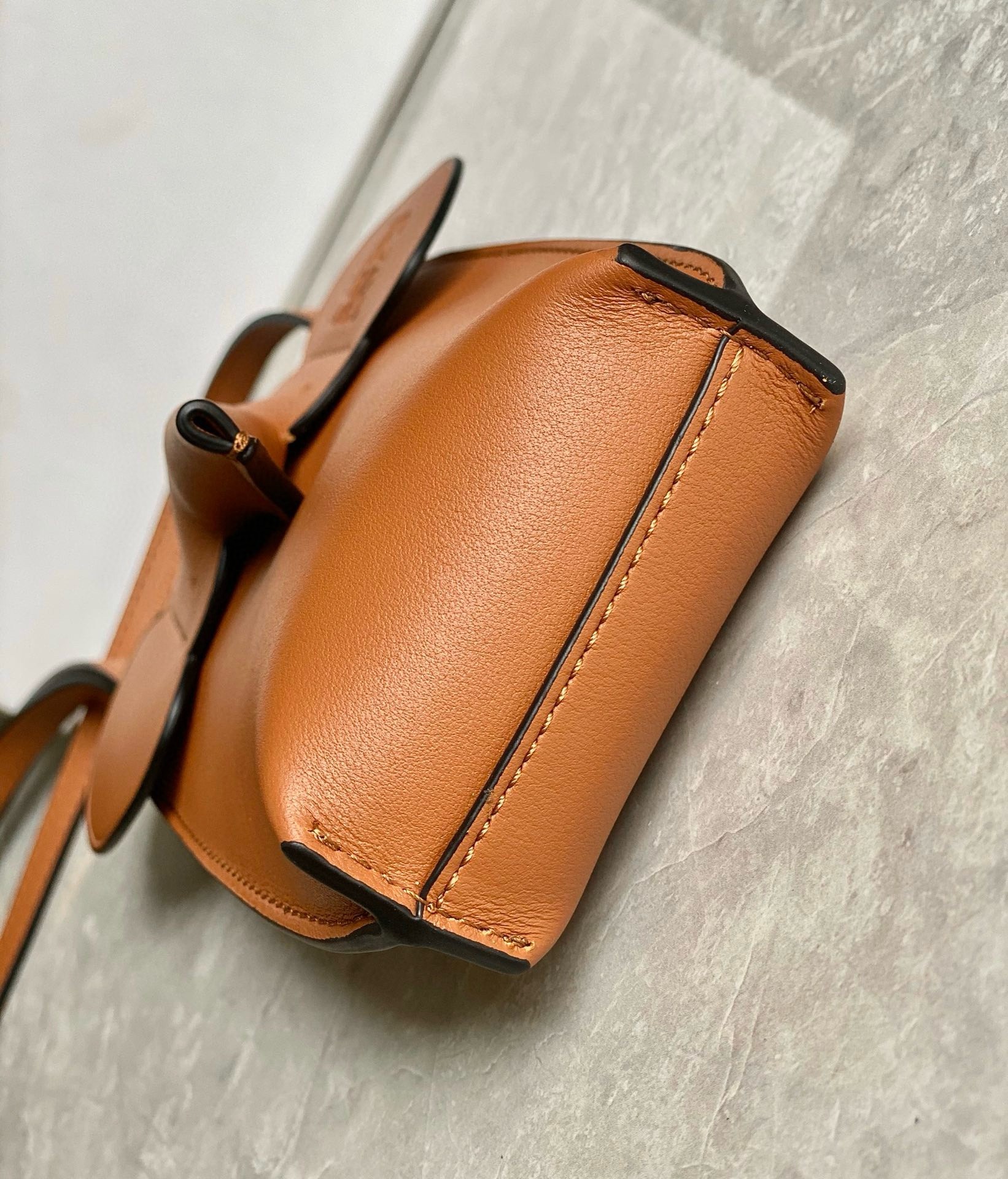 L0ew* elephant pocket in brown calfskin
