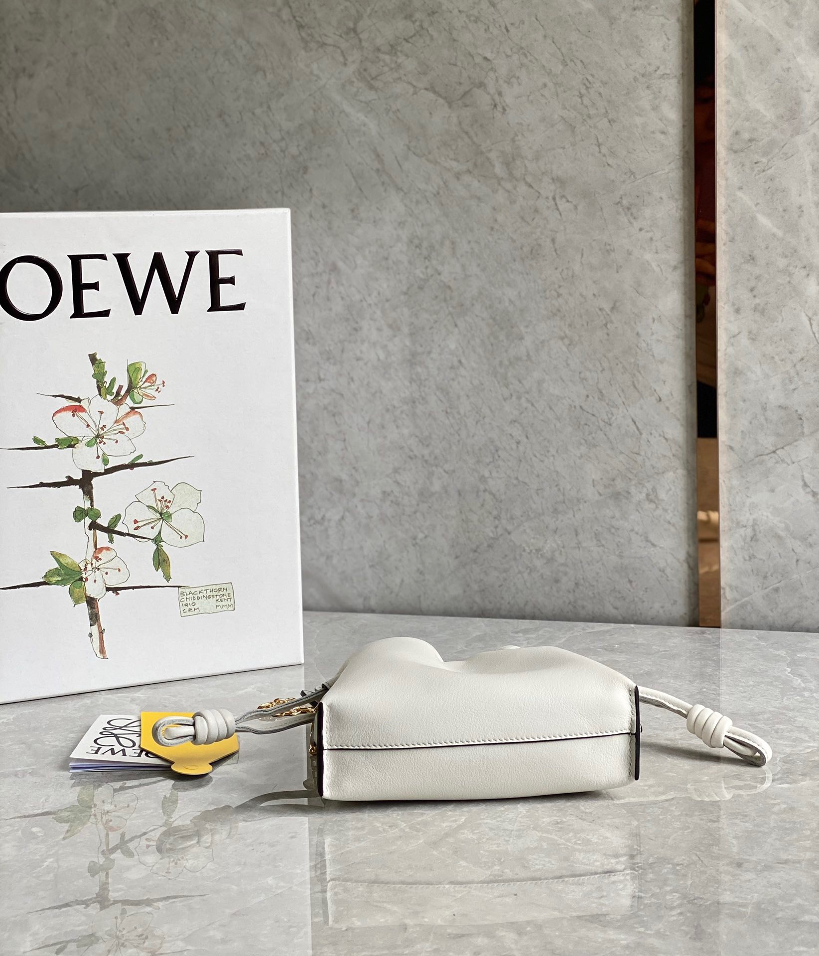 L0ew* flamenco nano clutch in white nappa leather