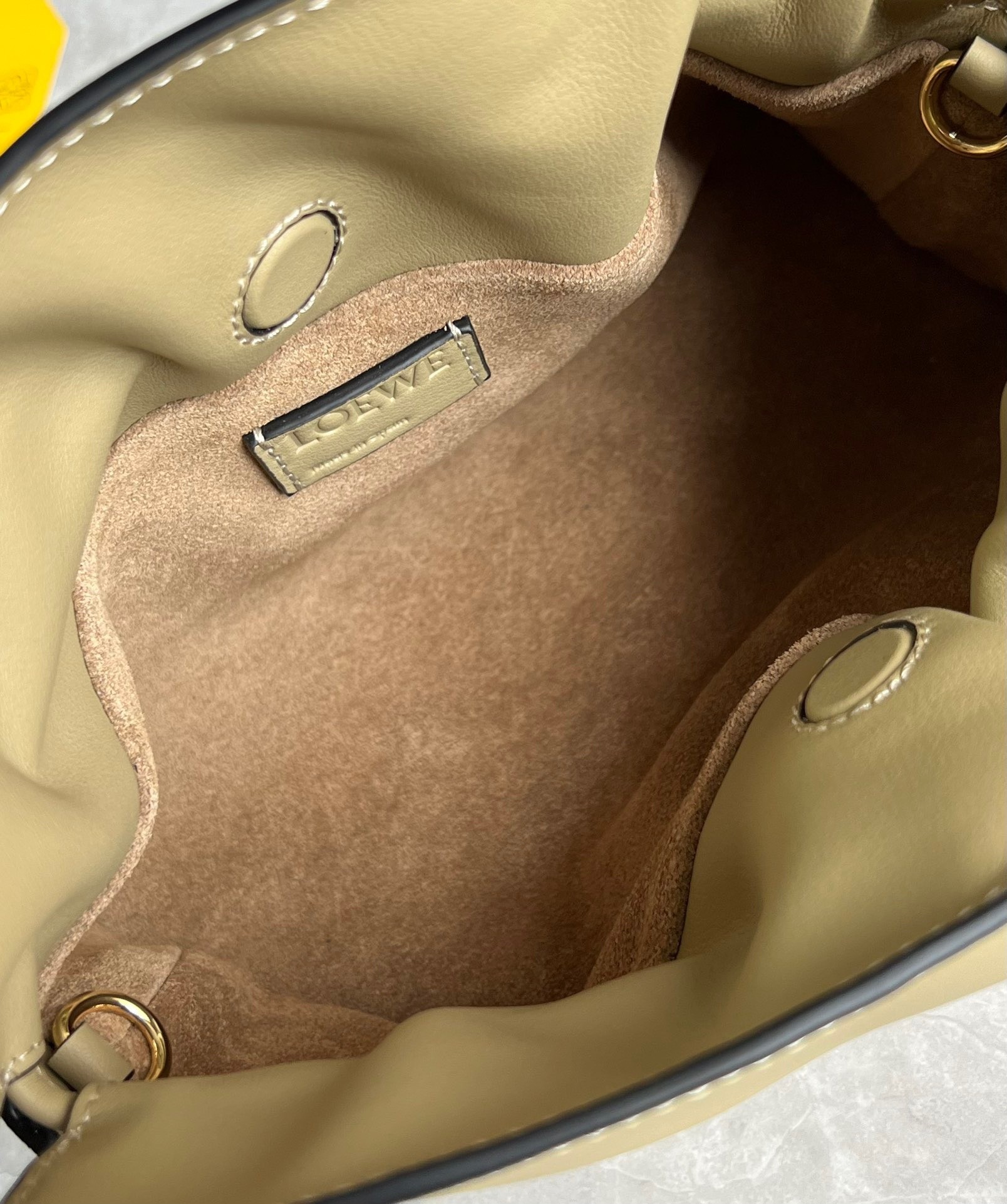 L0ew* mini flamenco clutch bag in clay green calfskin