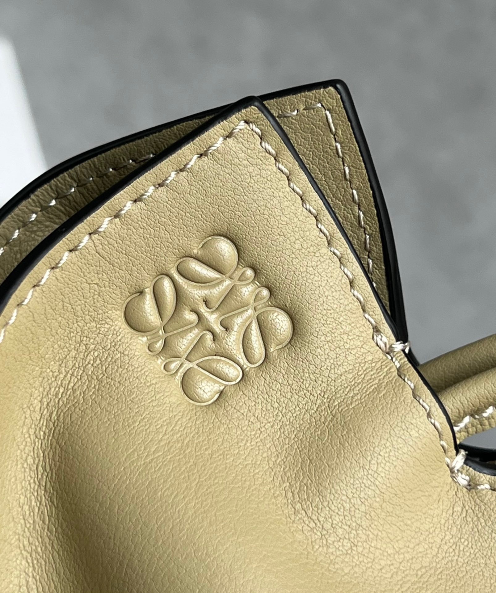 L0ew* mini flamenco clutch bag in clay green calfskin