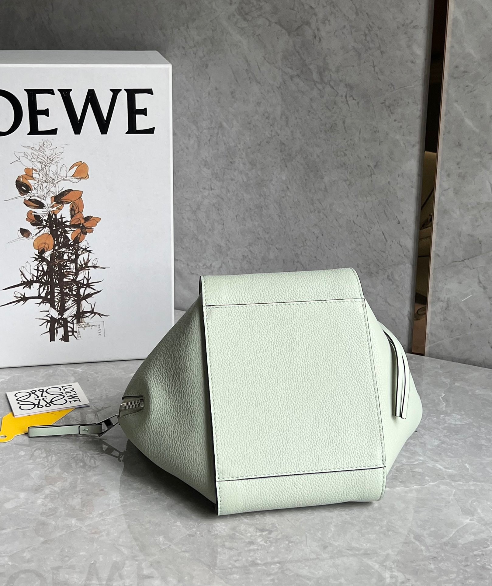 L0ew* compact hammock bag in light celadon grained calfskin