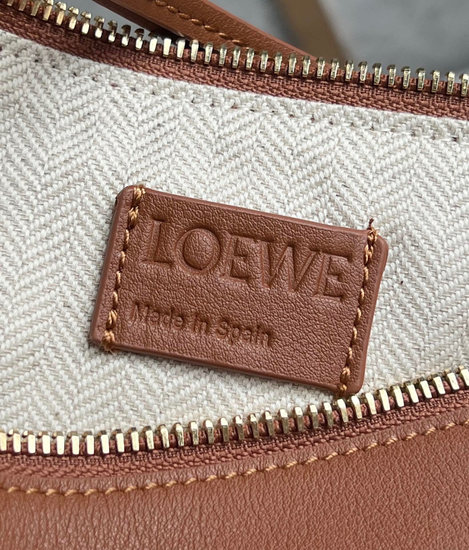 L0ew* mini hammock hobo bag in brown calfskin