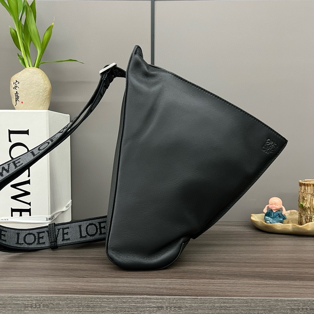 L0ew* anton sling bag in black calfskin and jacquard