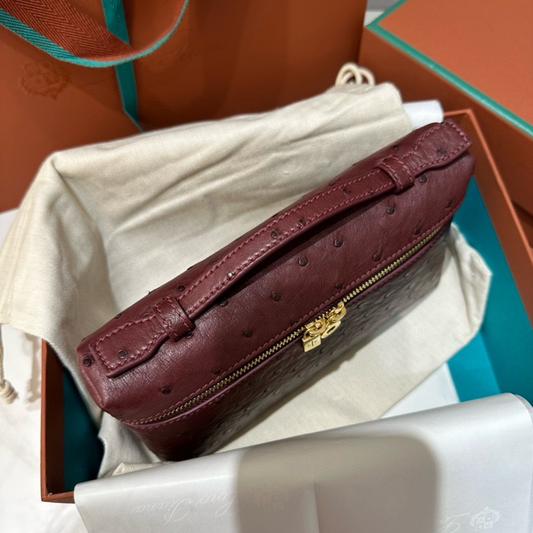 L**o p*ana extra pocket pouch l19 in burgundy ostrich-embossed leather