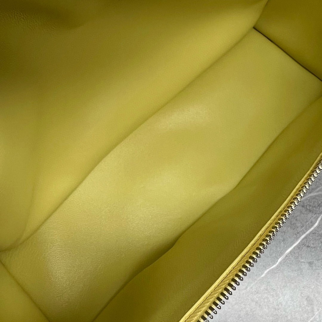 L**o p*ana extra pocket pouch l27 in yellow grained leather