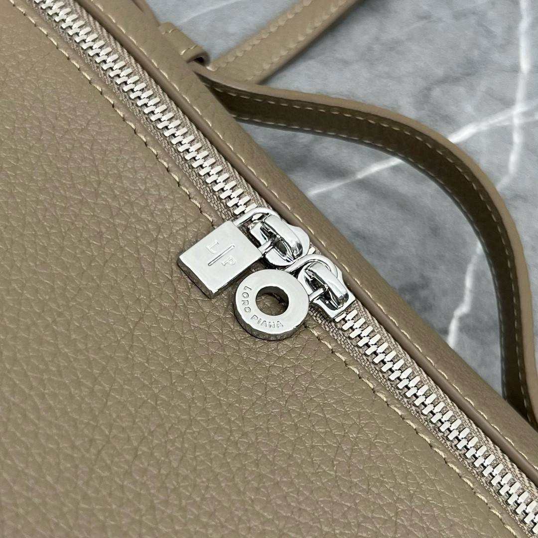 L**o p*ana extra pocket pouch l27 in taupe grained leather