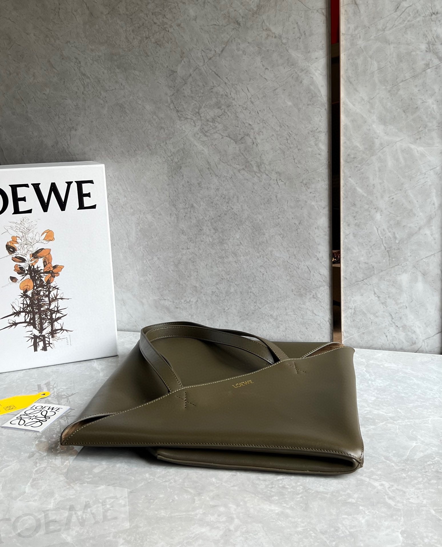 L0ew* large puzzle fold tote bag in dark green calfskin