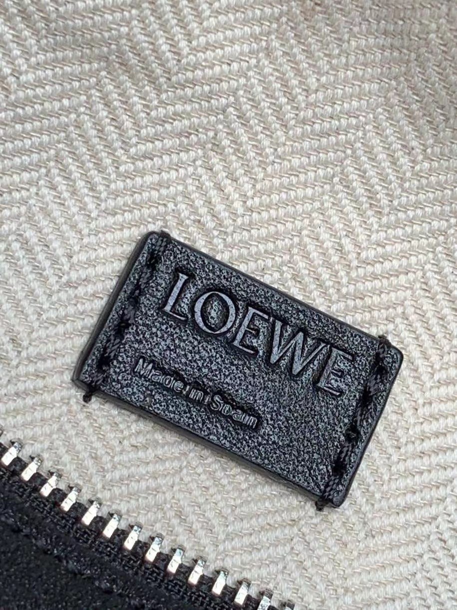 L0ew* mini puzzle bag in black calfskin leather