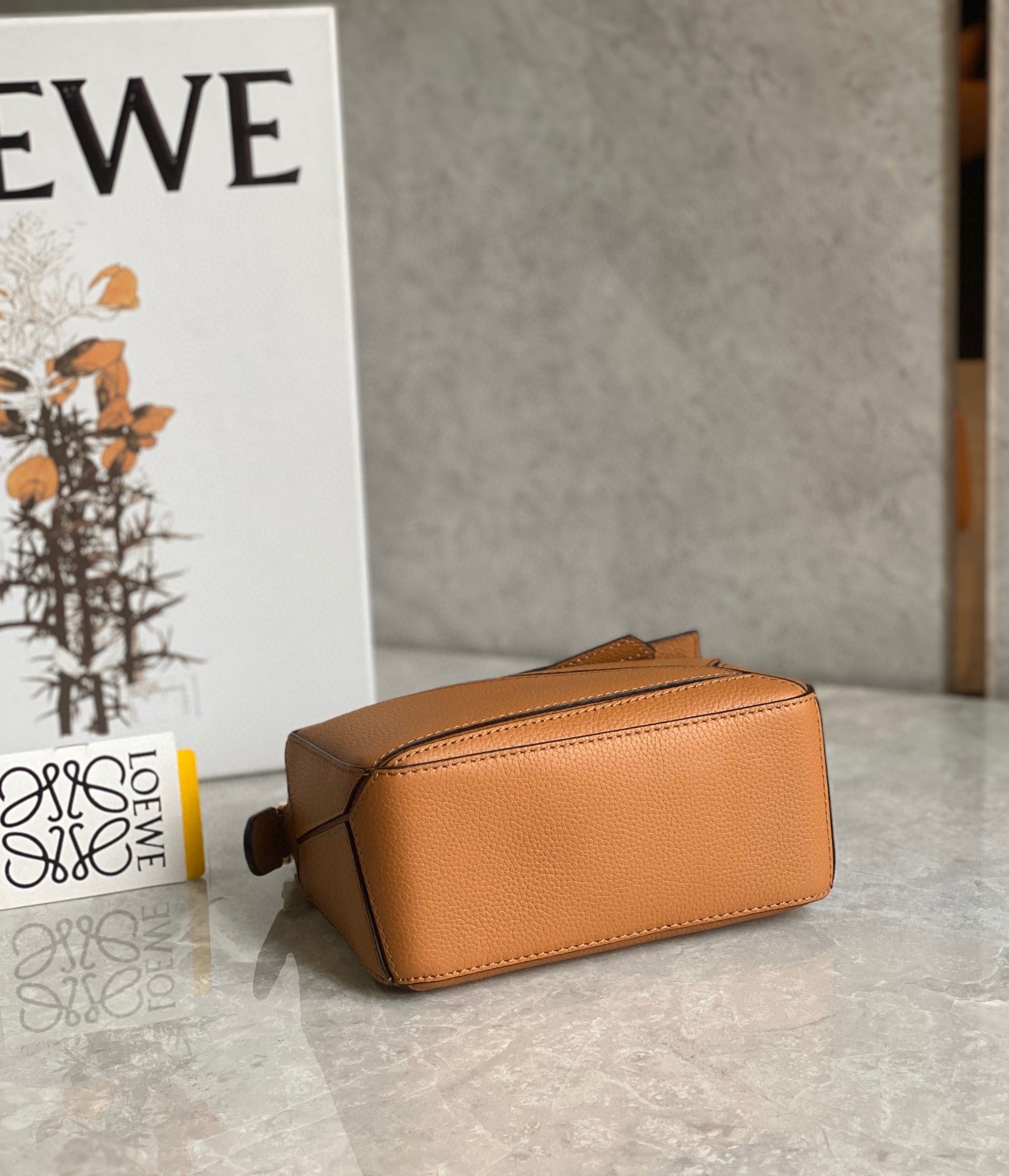 L0ew* puzzle mini bag in brown grained calfskin