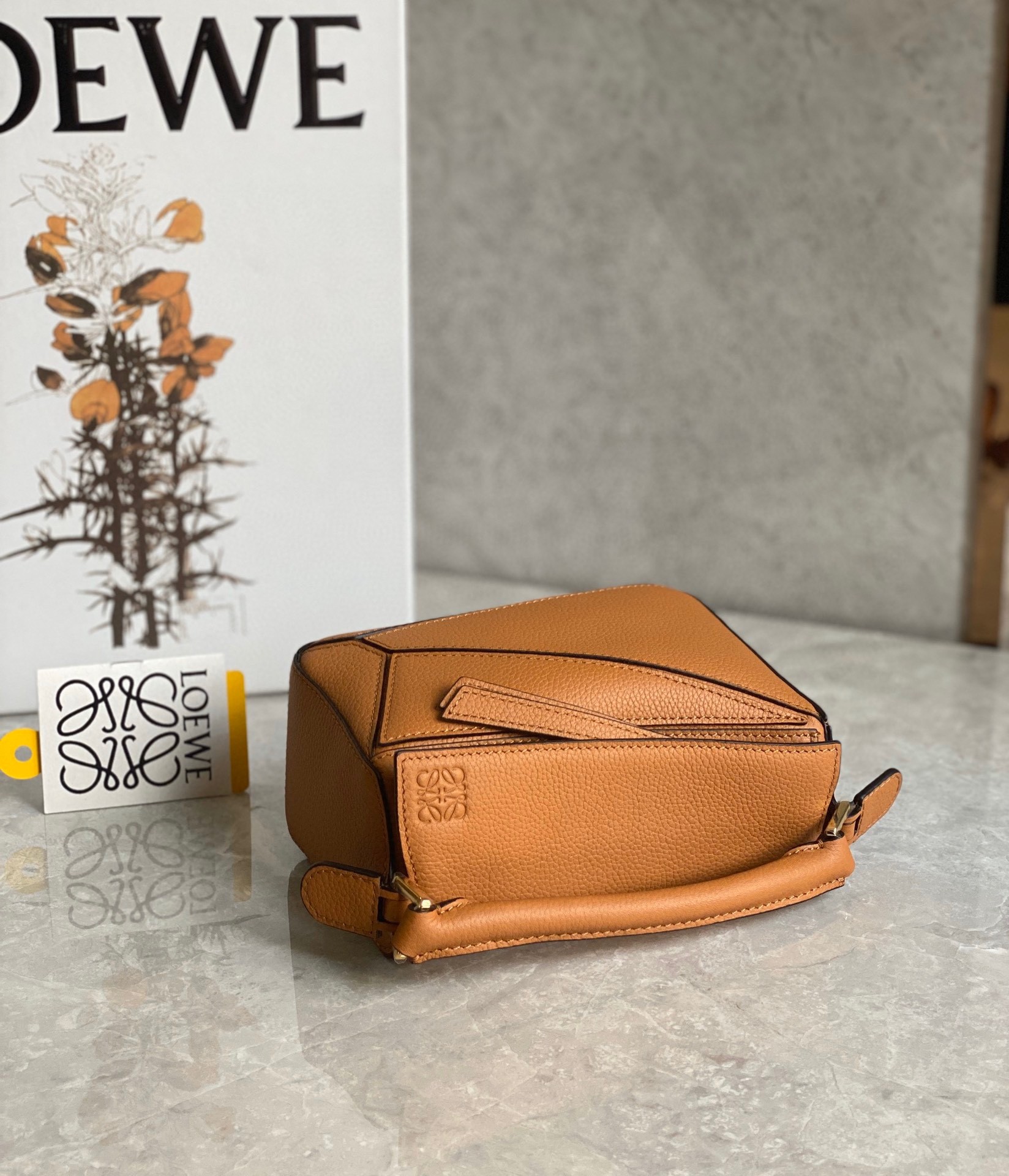 L0ew* puzzle mini bag in brown grained calfskin