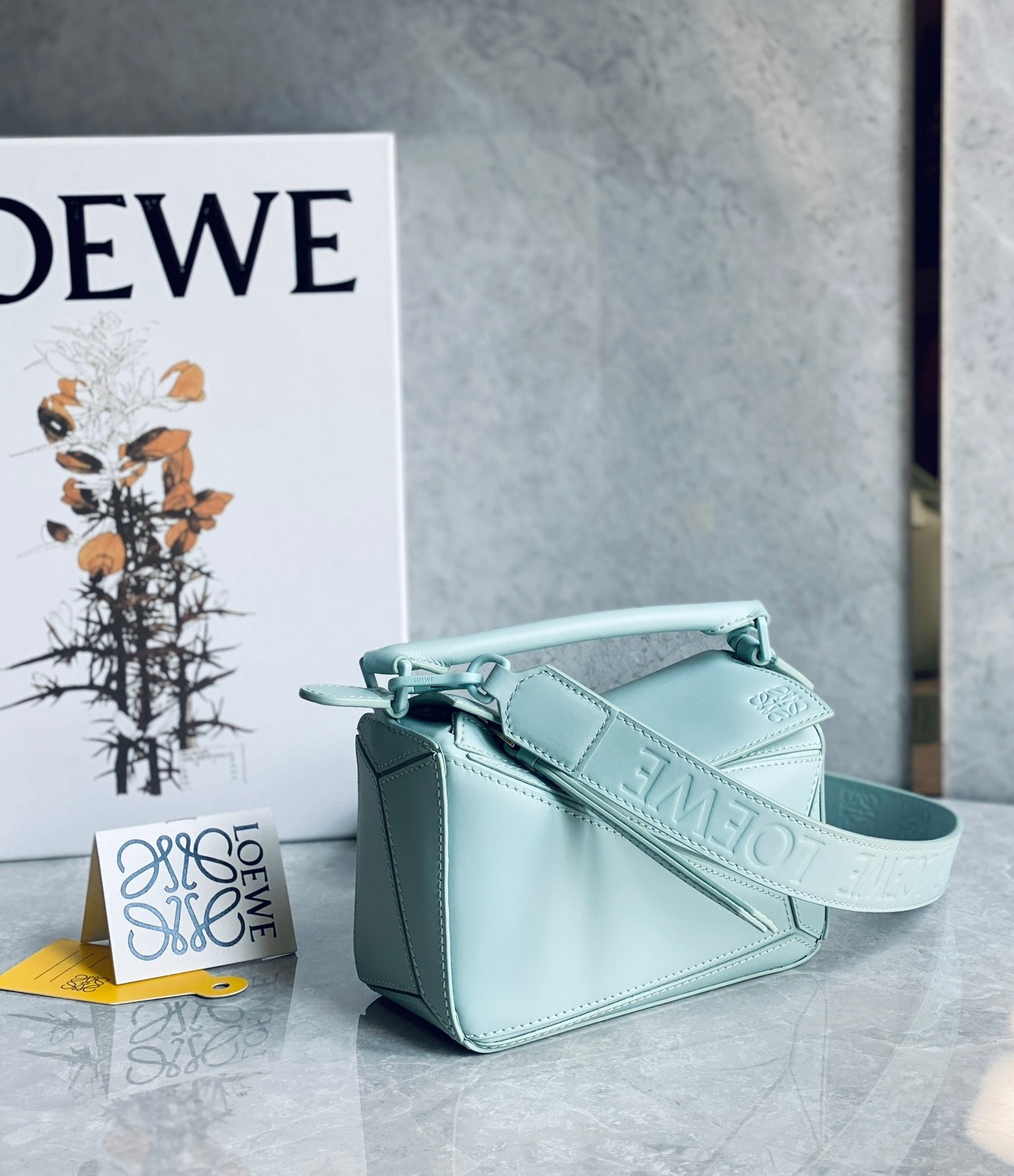 L0ew* puzzle mini bag in aquamarine satin calfskin