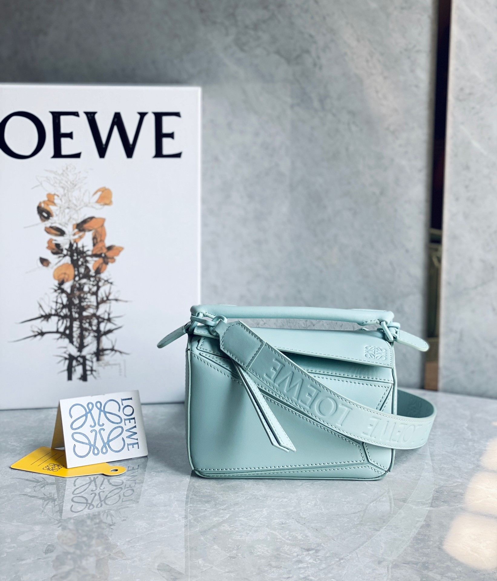 L0ew* puzzle mini bag in aquamarine satin calfskin