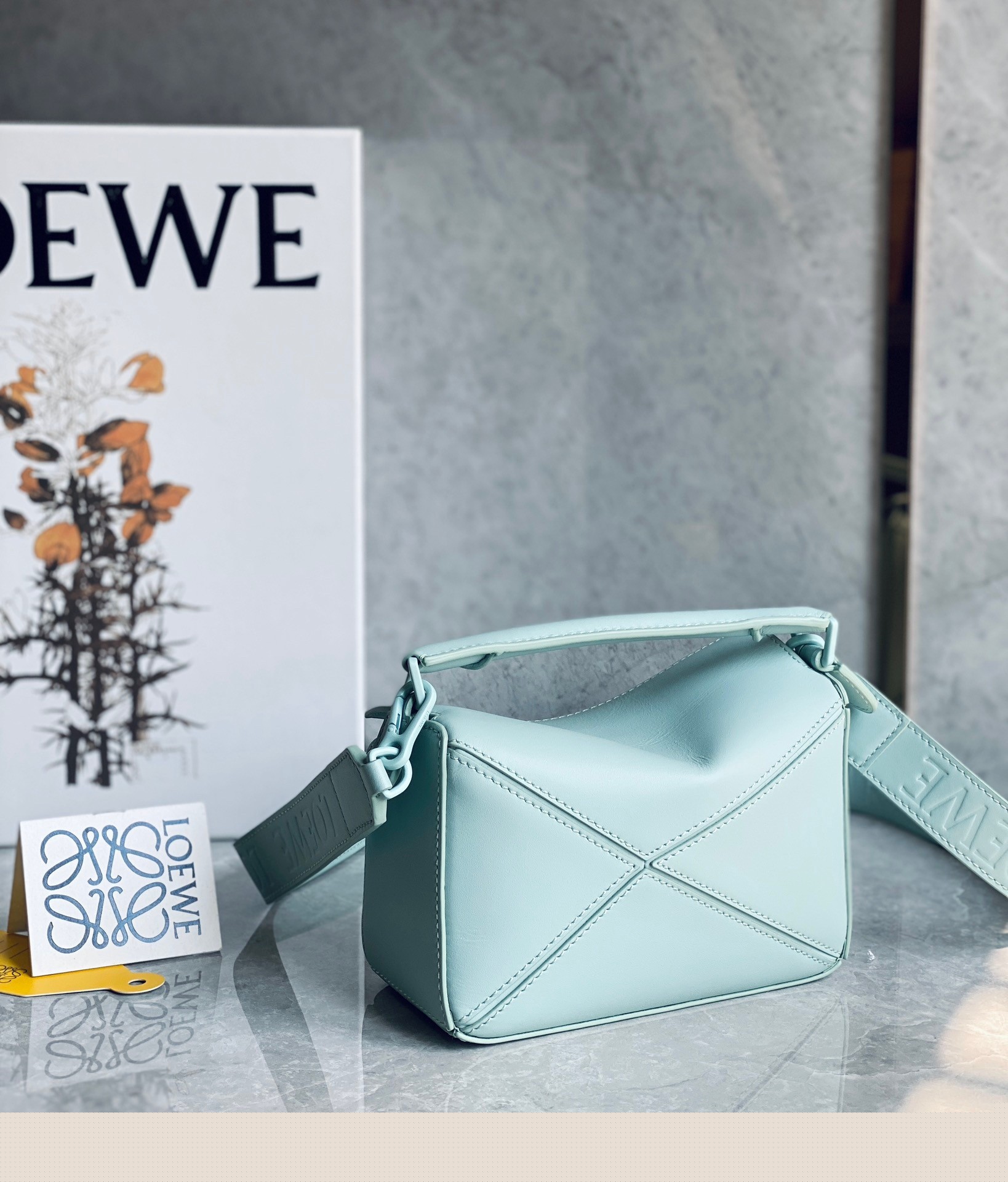 L0ew* puzzle mini bag in aquamarine satin calfskin