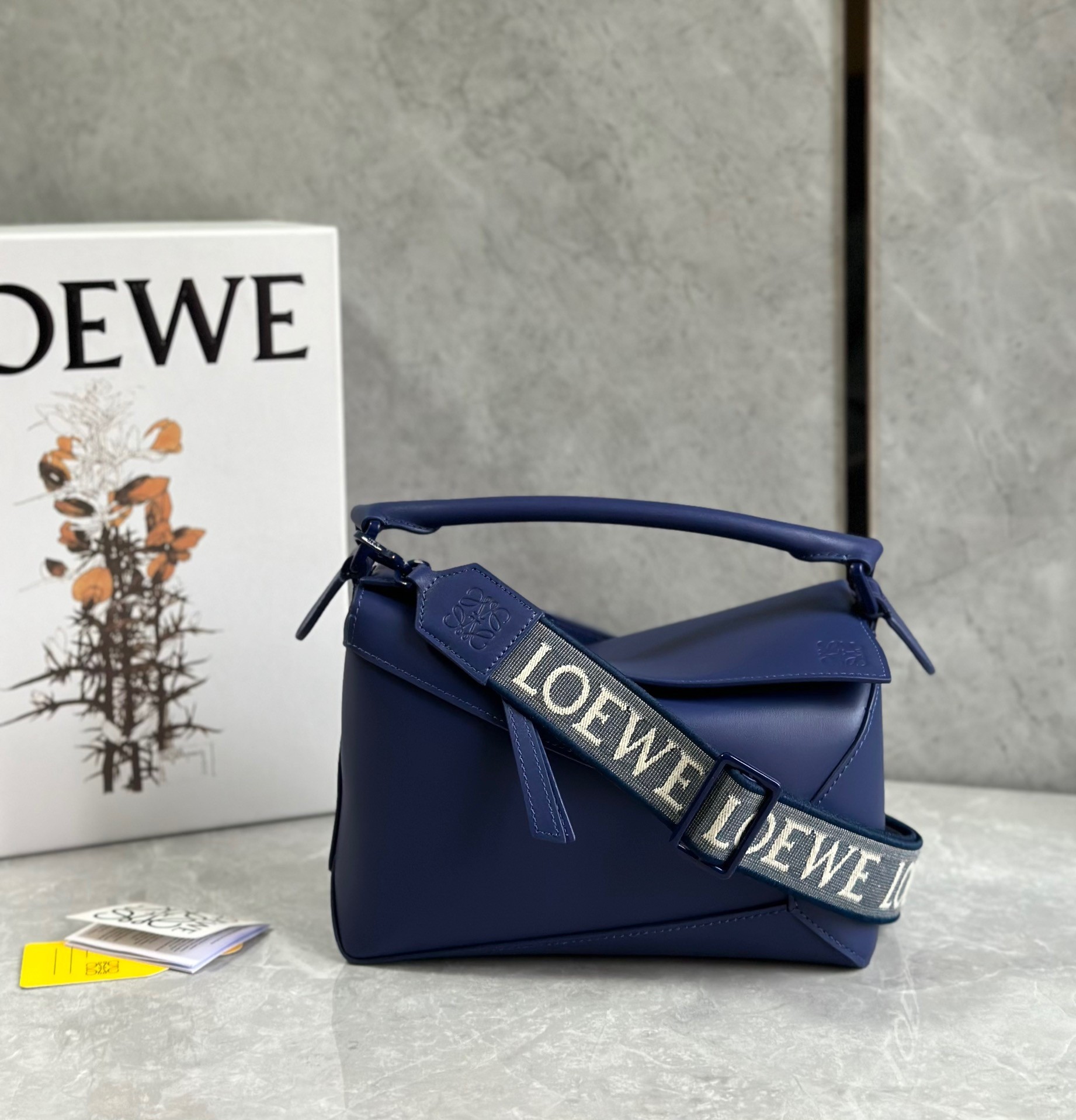 L0ew* puzzle edge small bag in deep purple satin calfskin