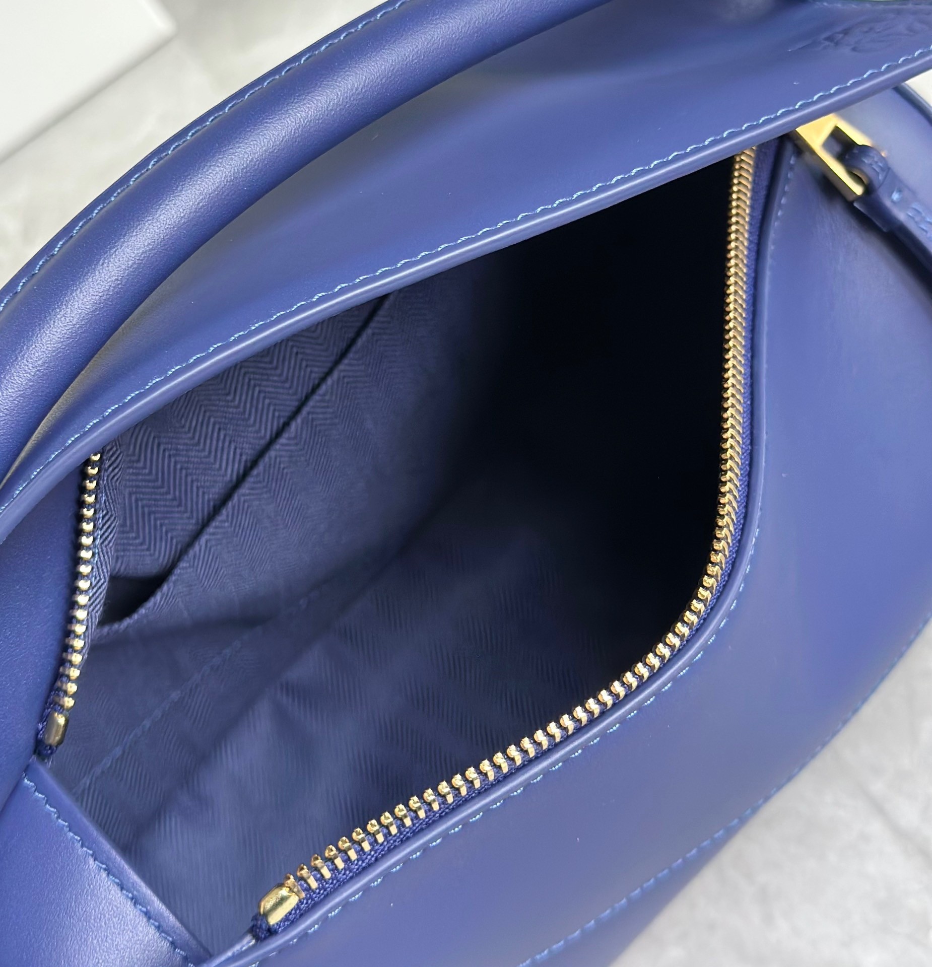 L0ew* puzzle edge small bag in deep purple satin calfskin