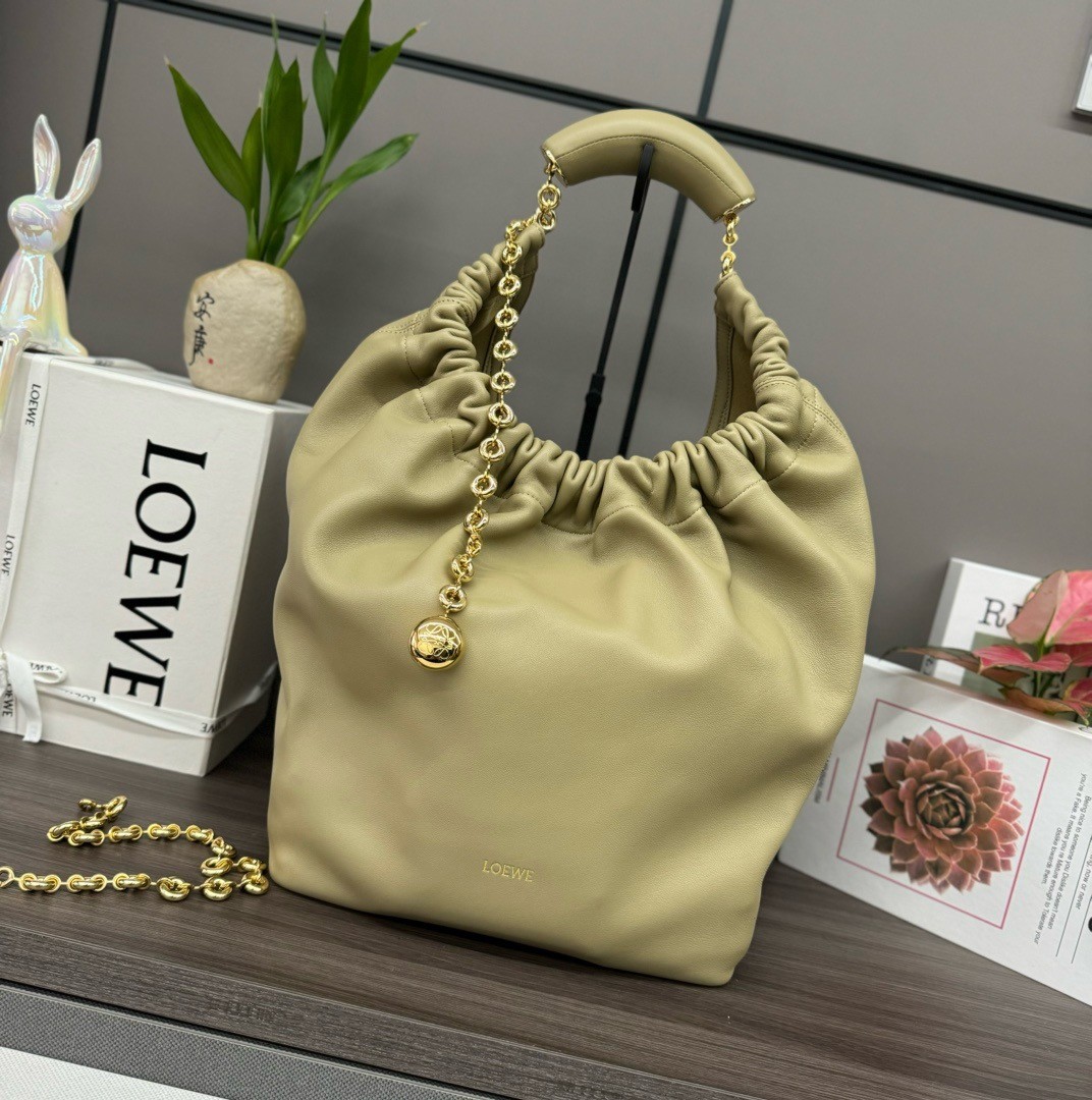 L0ew* medium squeeze bag in clay green nappa lambskin