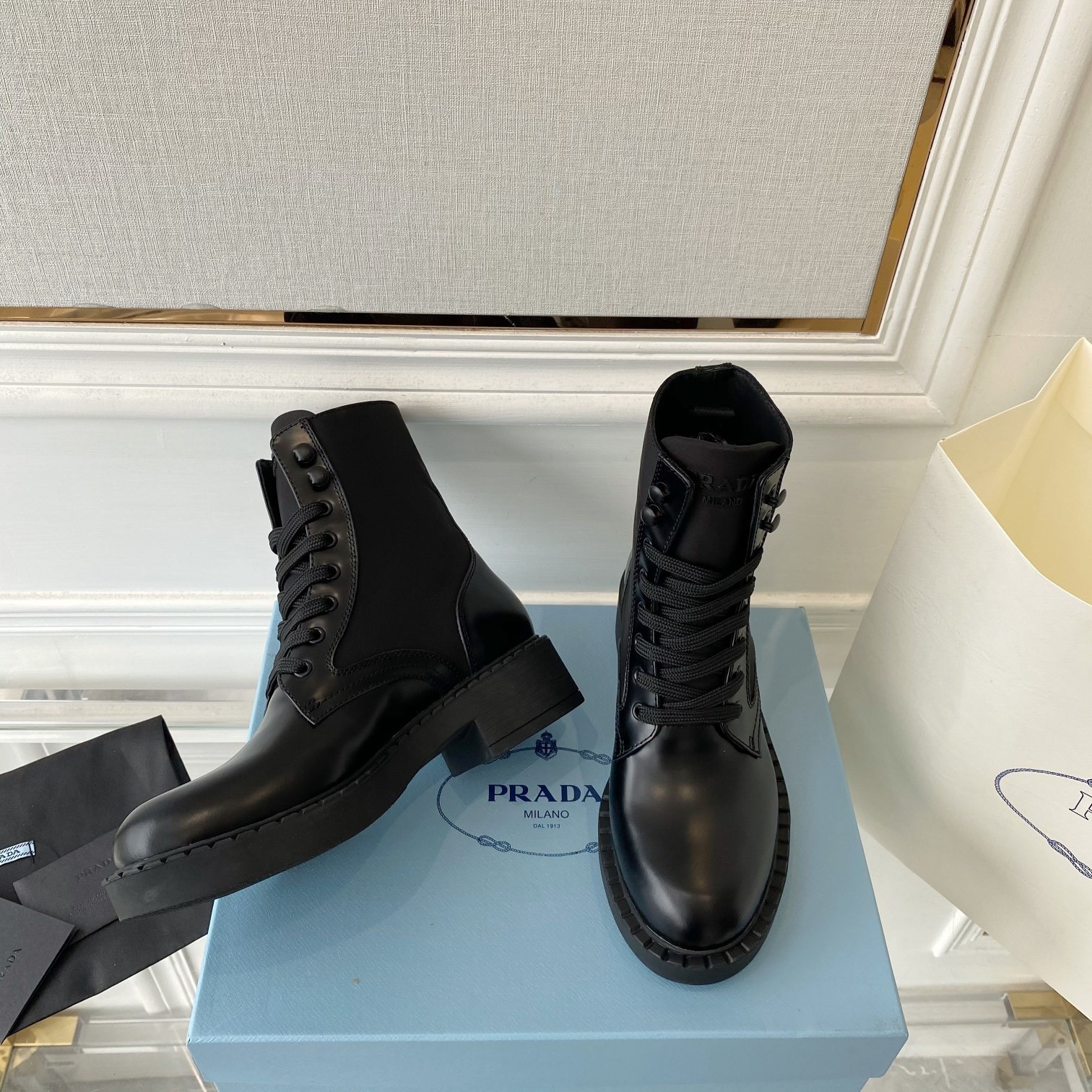 Pra*a ankle boots in black brushed leather and re-nylon