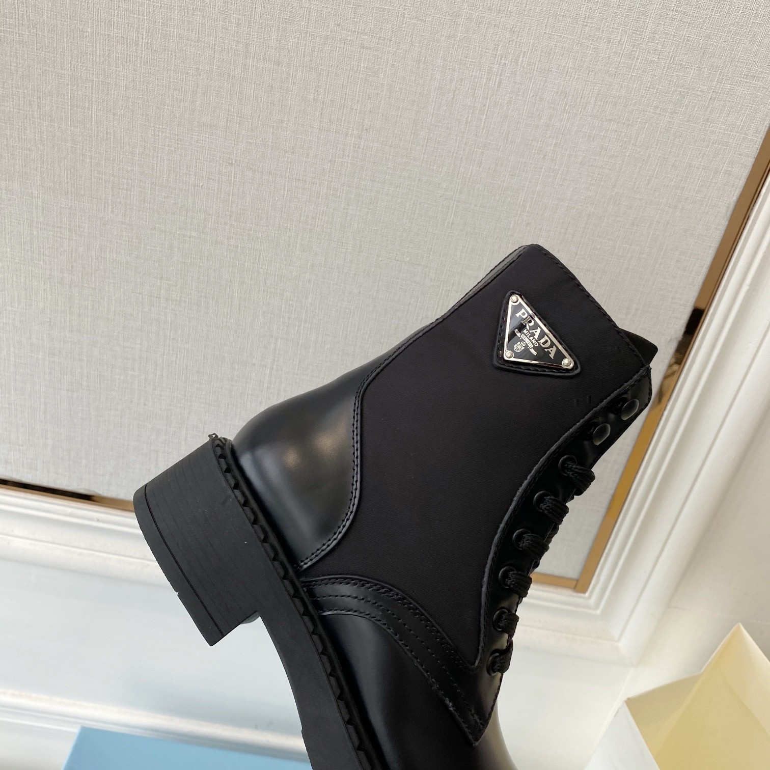 Pra*a ankle boots in black brushed leather and re-nylon
