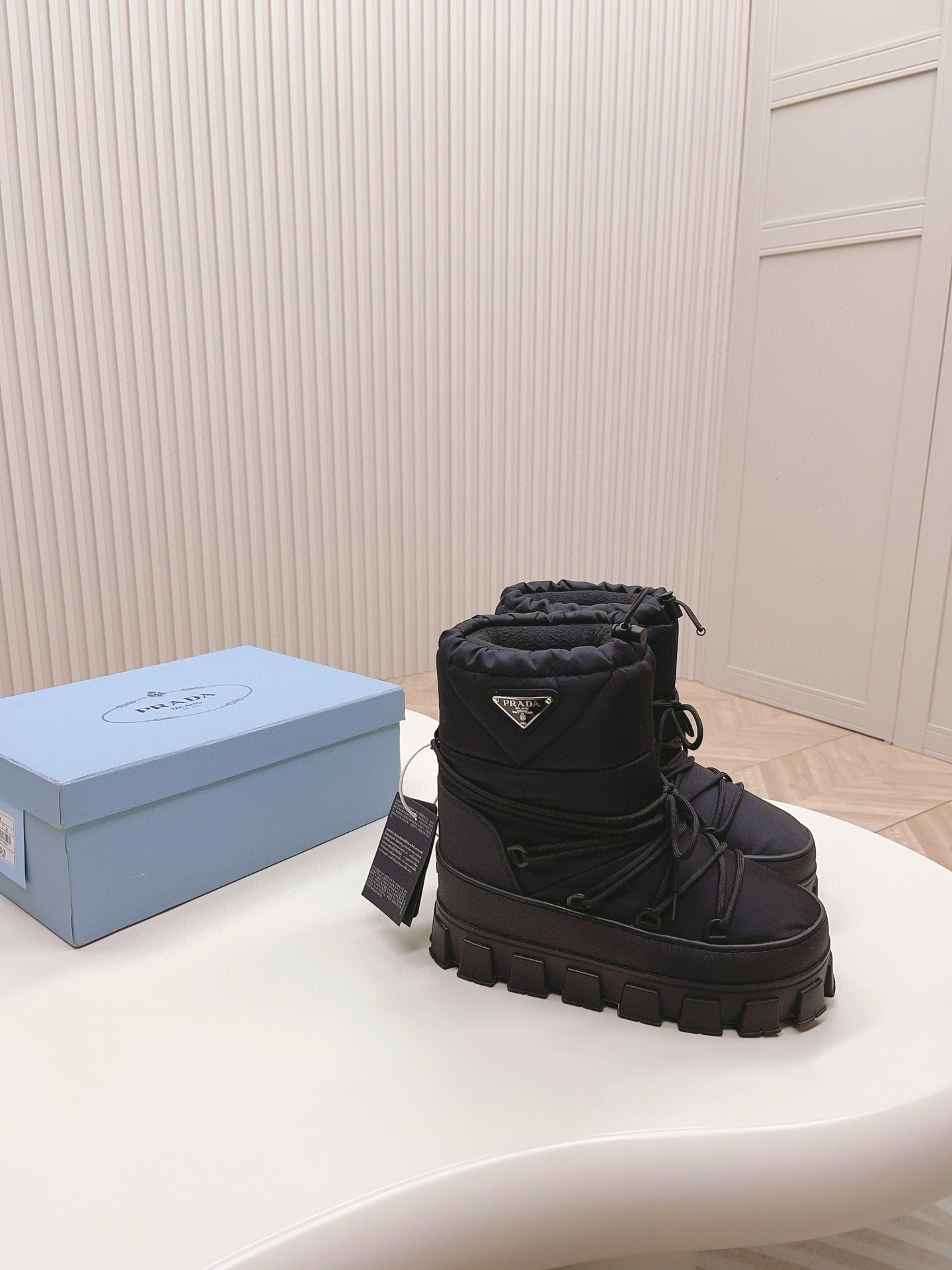 Pra*a gabardine après-ski boots in black nylon