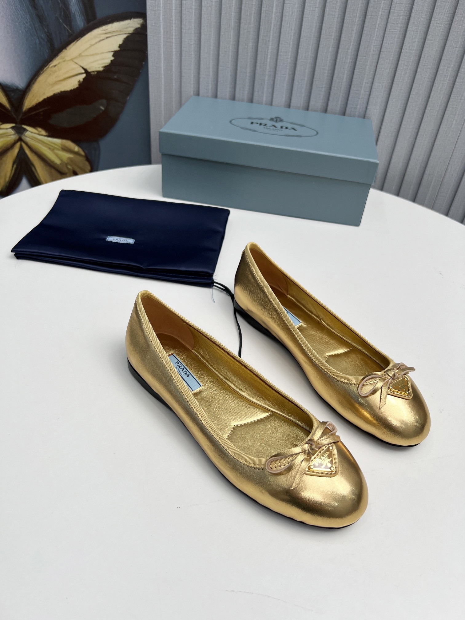 Pra*a ballerinas in gold nappa leather