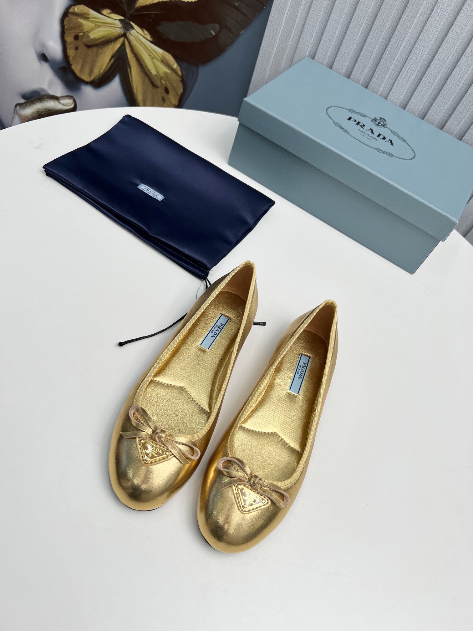 Pra*a ballerinas in gold nappa leather