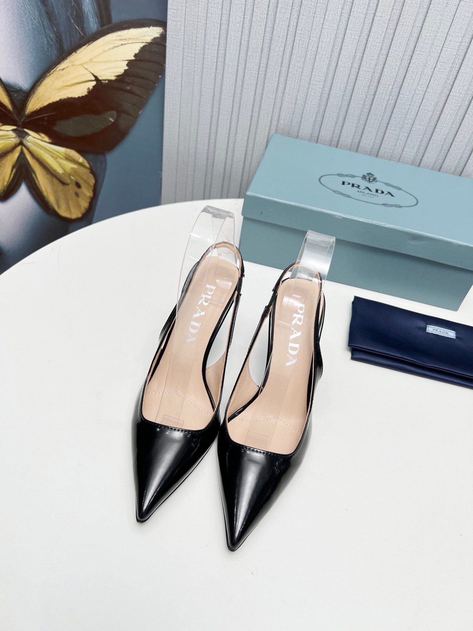 Pra*a slingbacks pumps 95mm in black patent leather