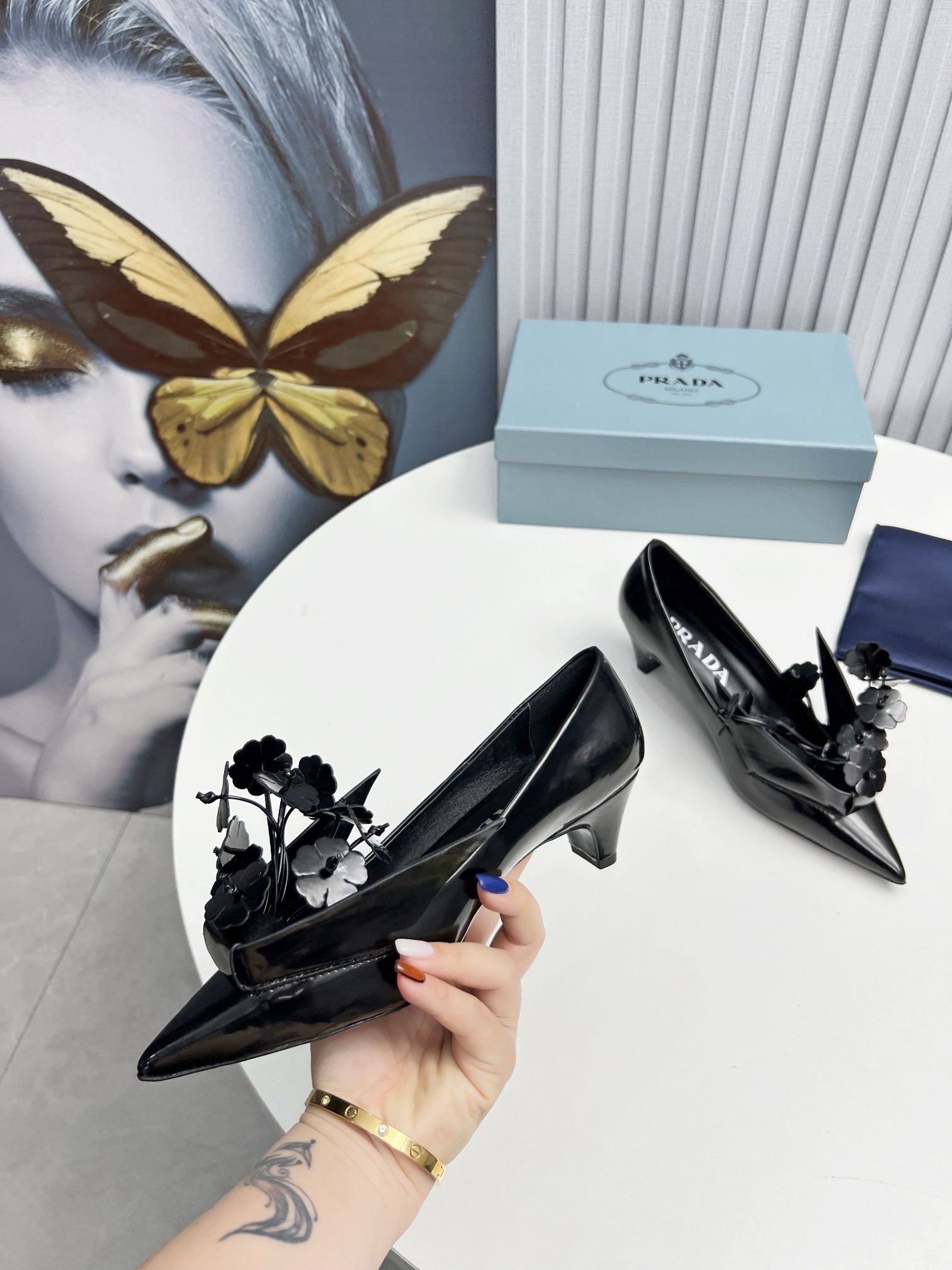 Pra*a pumps 45mm in black leather with floral appliques