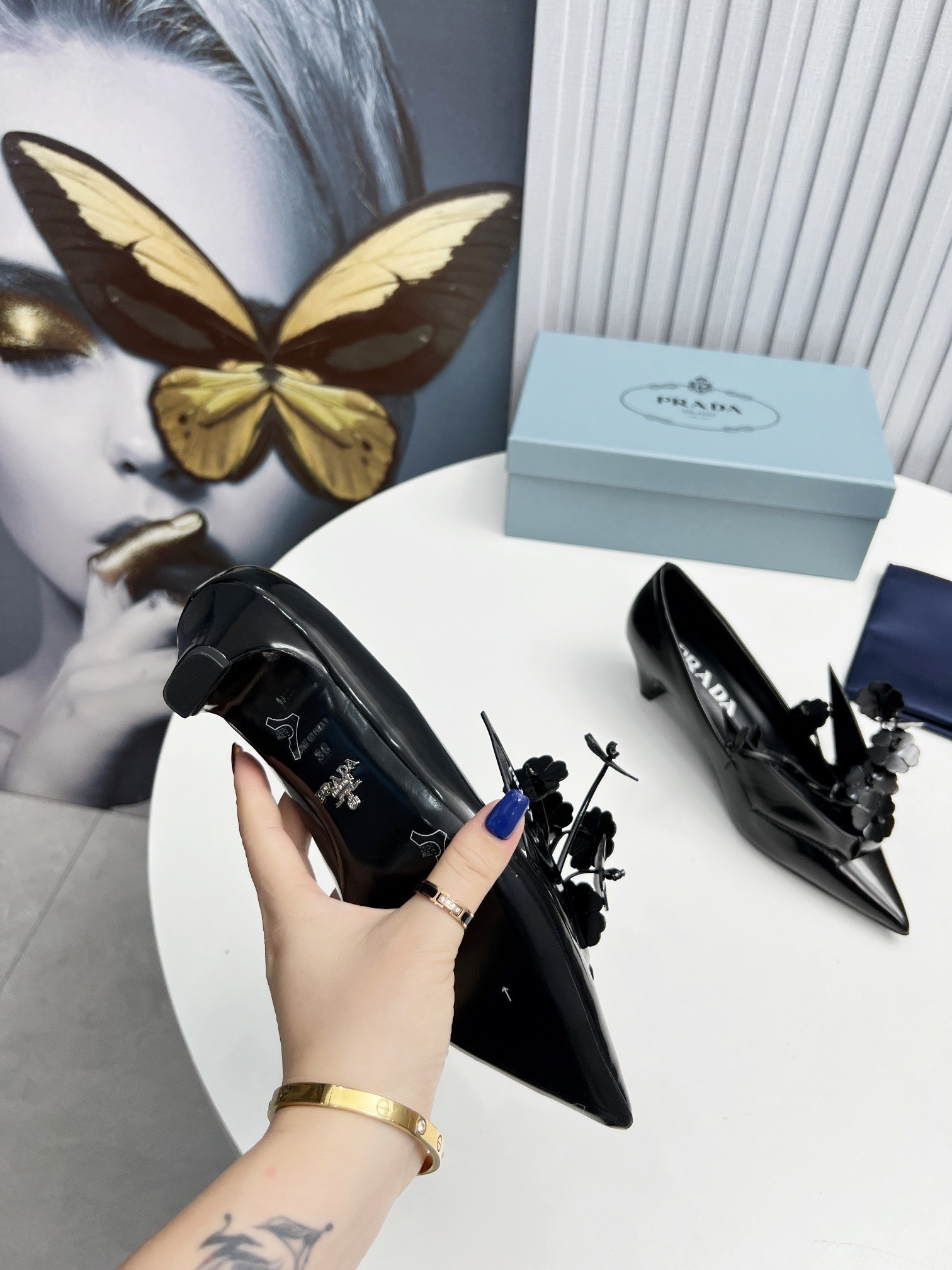 Pra*a pumps 45mm in black leather with floral appliques