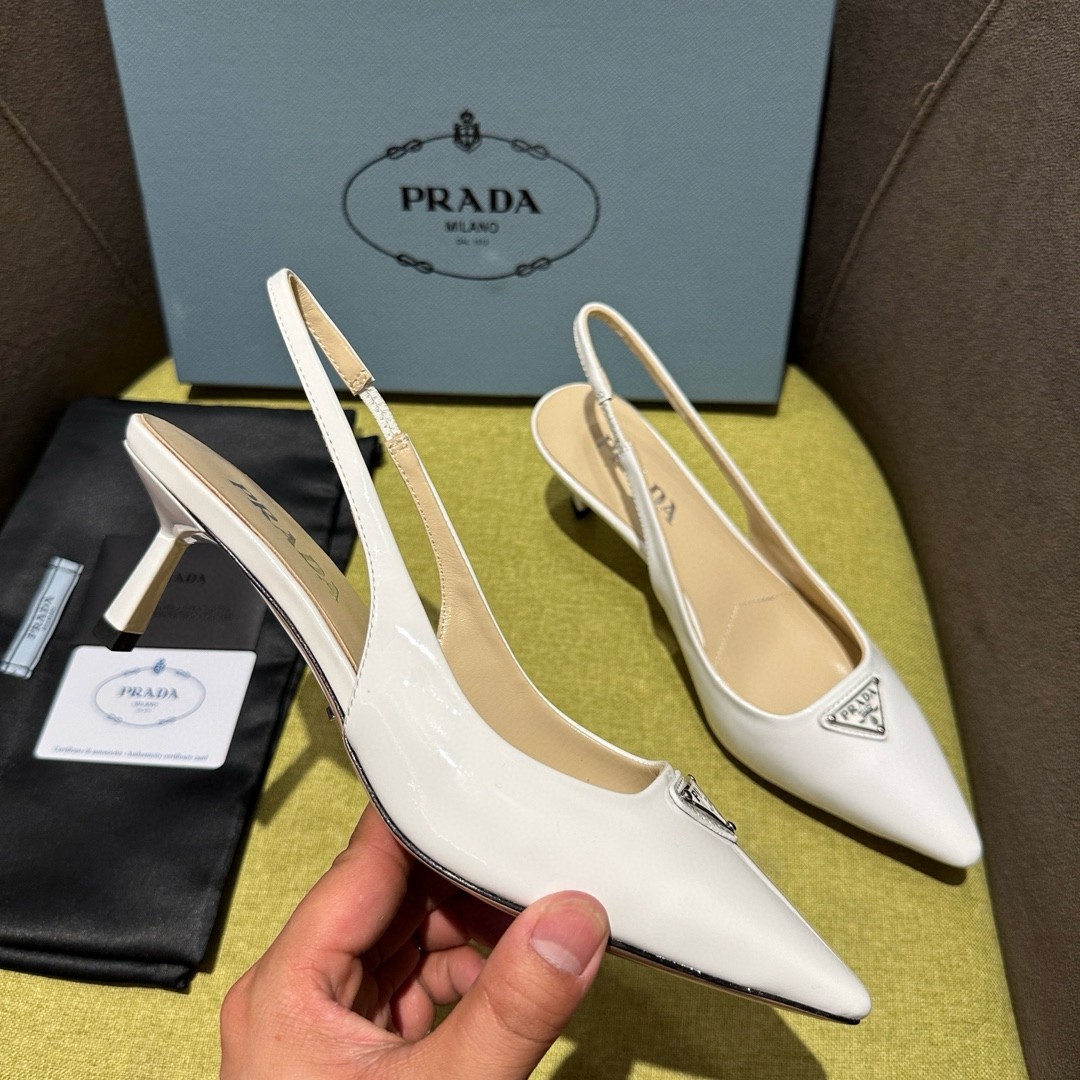 Pra*a slingback pumps 55mm in white patent leather