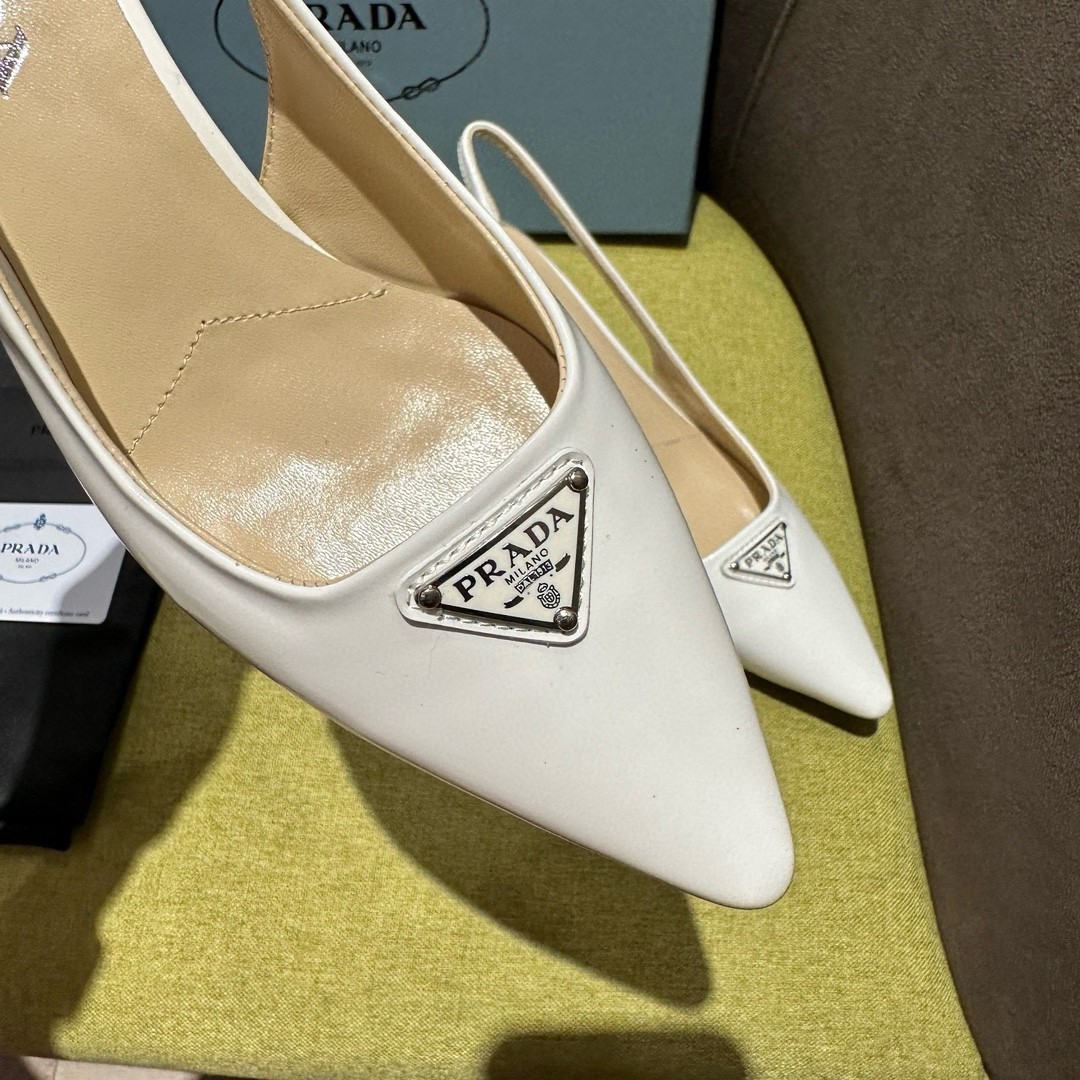 Pra*a slingback pumps 55mm in white patent leather