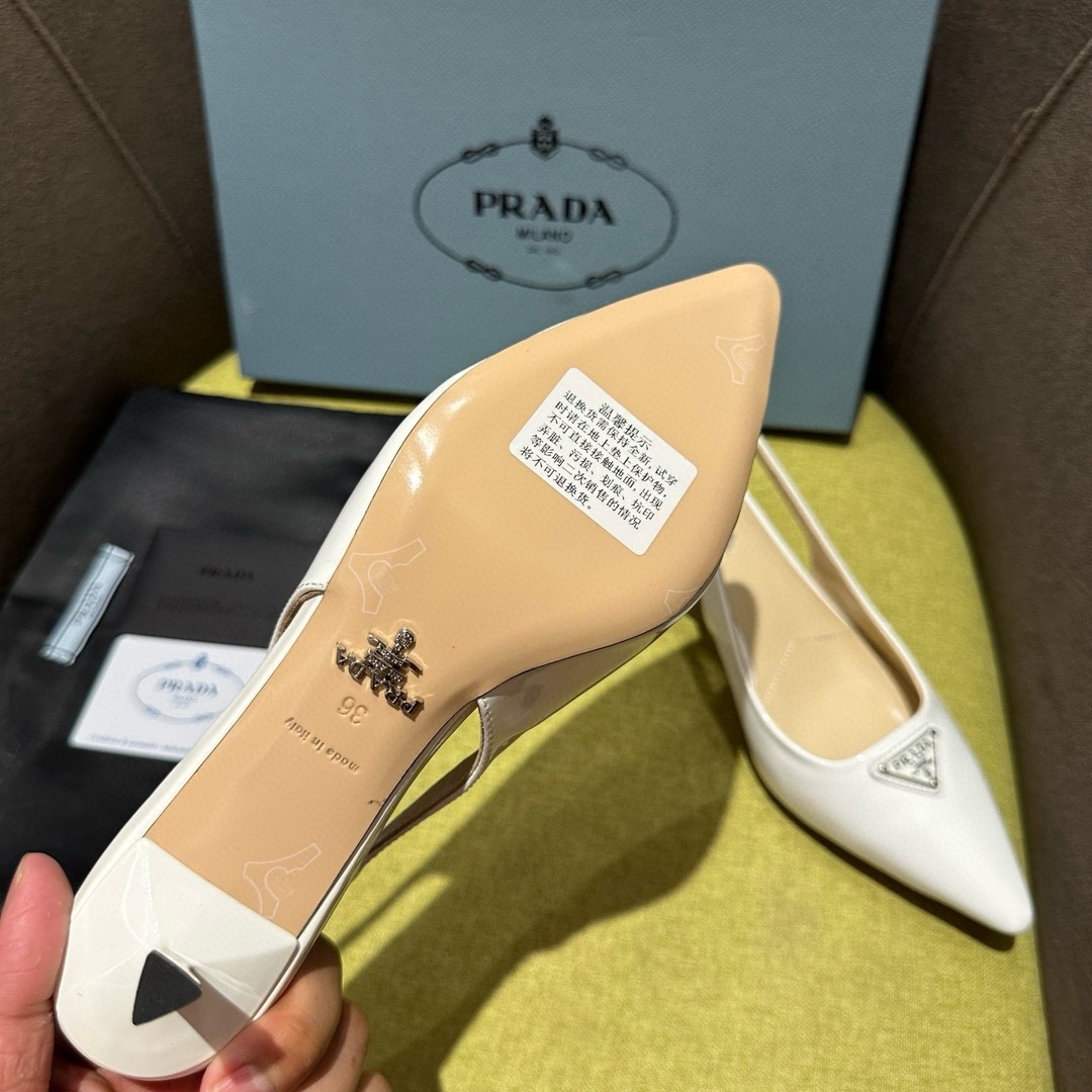 Pra*a slingback pumps 55mm in white patent leather