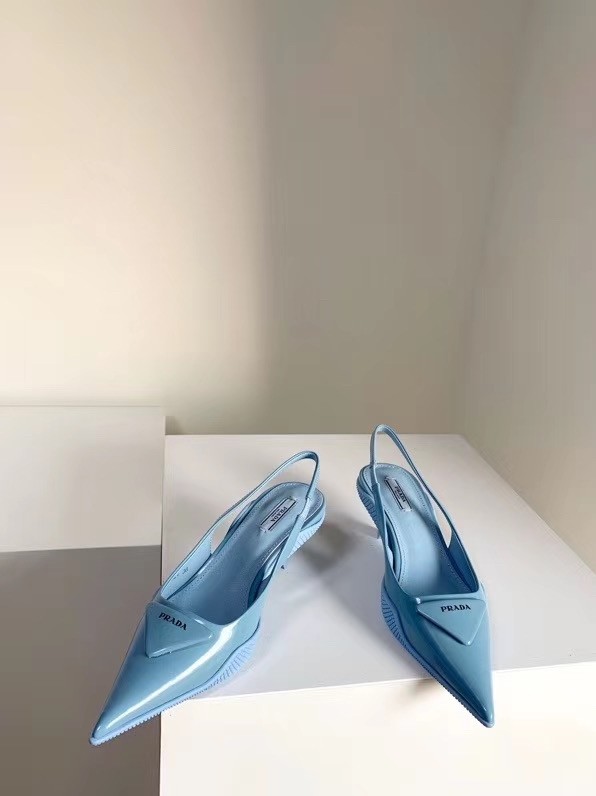 Pra*a slingback pumps in light blue brushed leather