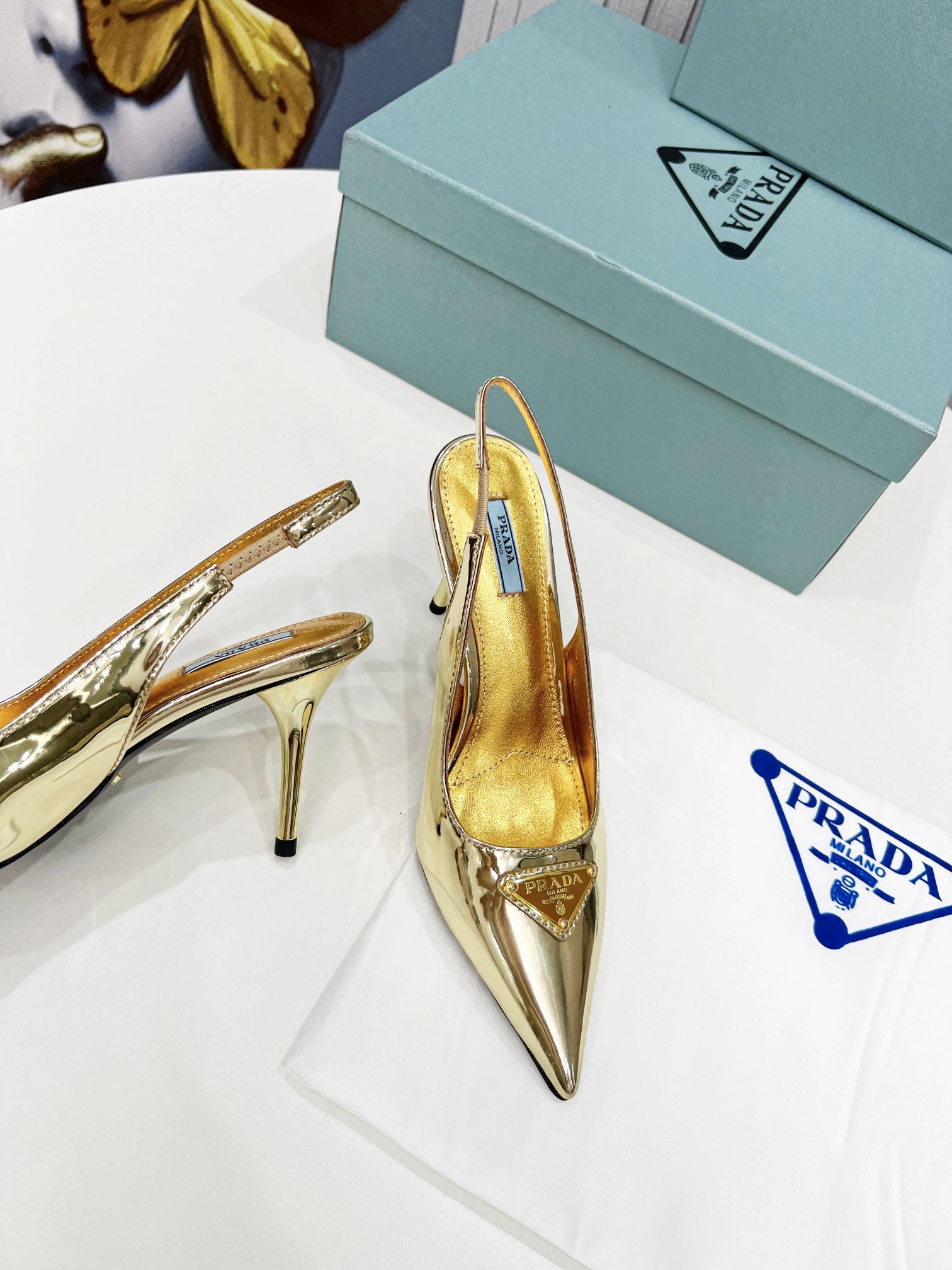 Pra*a slingbacks pumps 85mm in gold metallic leather