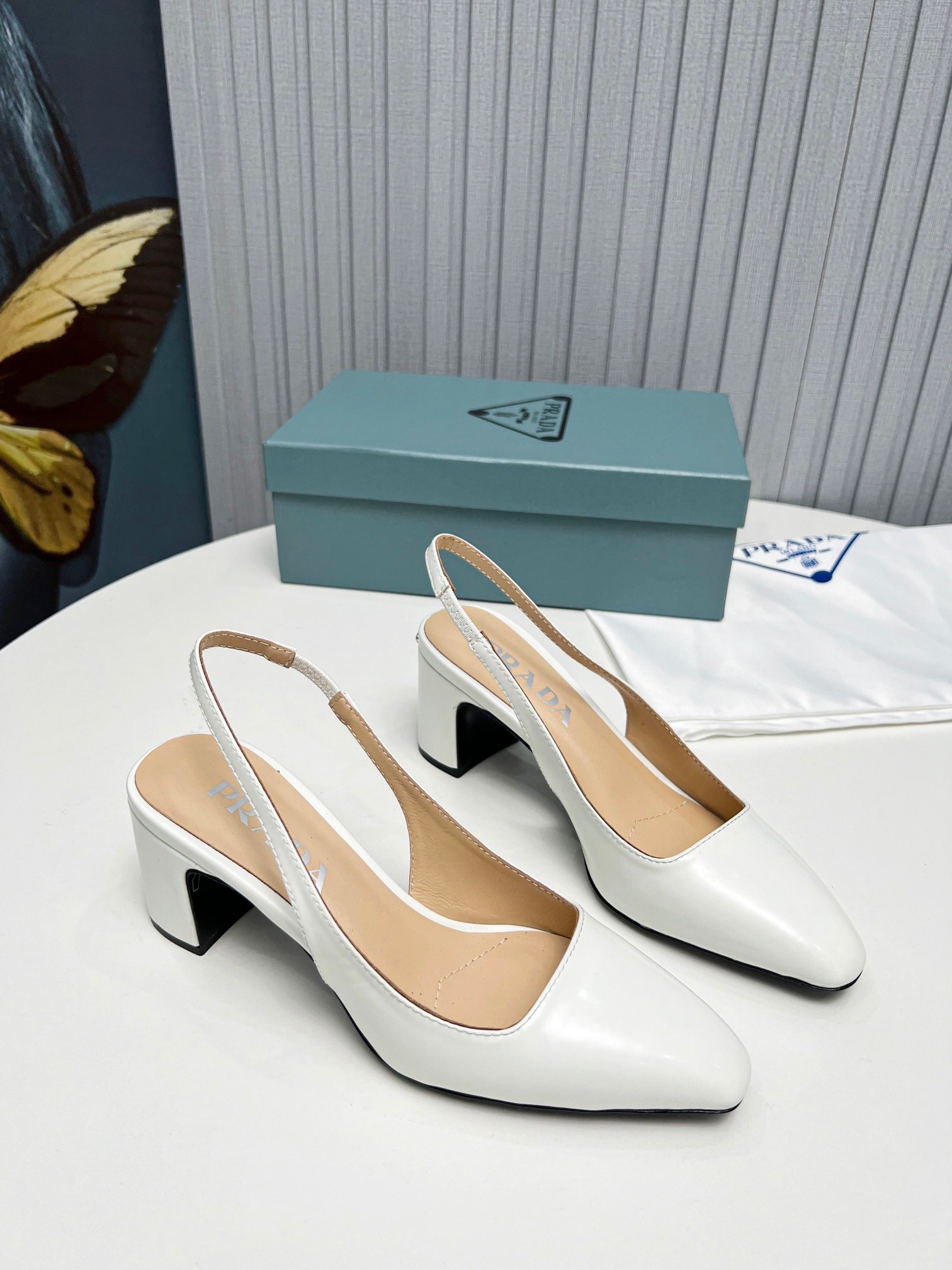 Pra*a slingbacks pumps 65mm in white patent leather