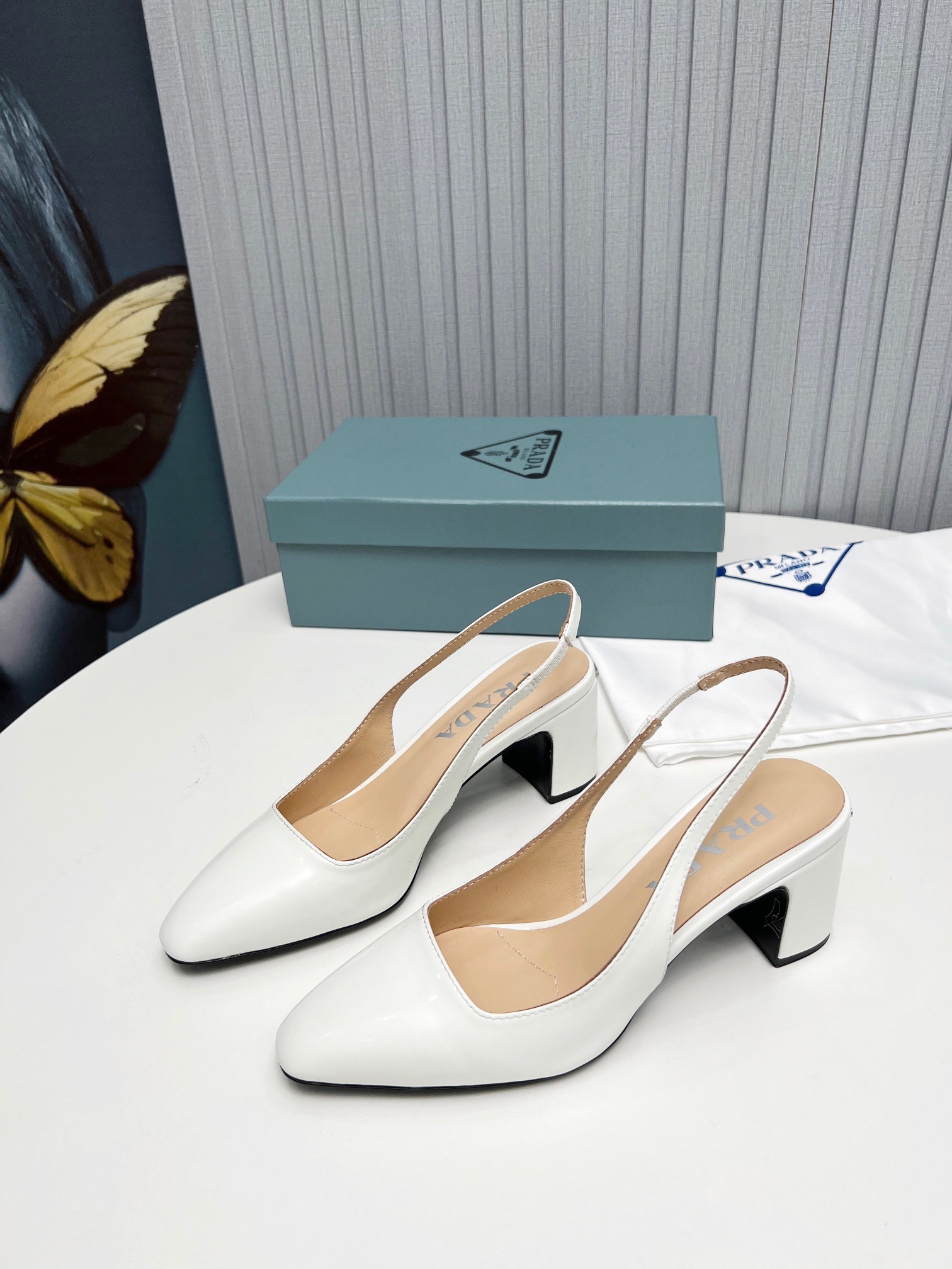 Pra*a slingbacks pumps 65mm in white patent leather
