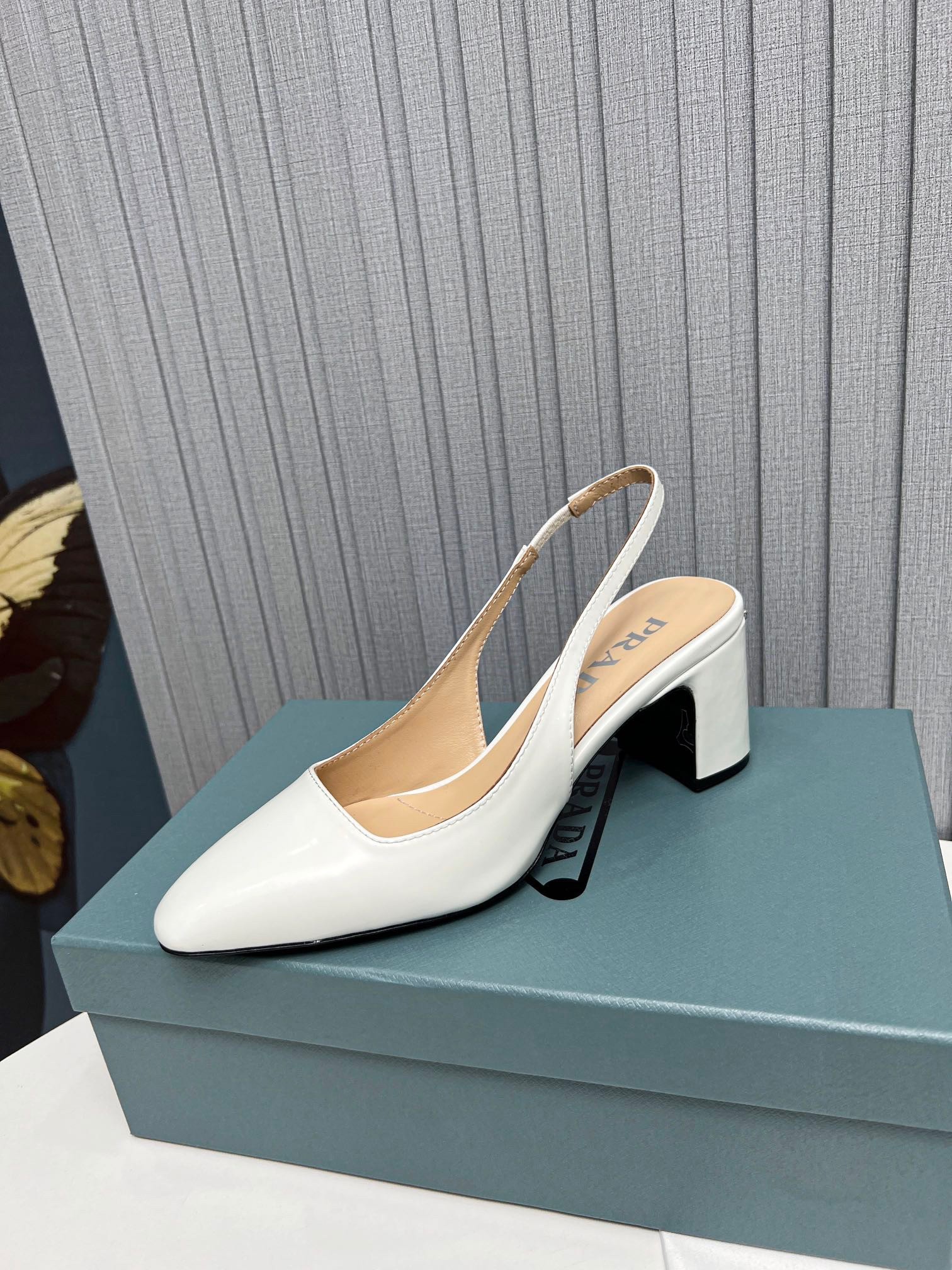 Pra*a slingbacks pumps 65mm in white patent leather