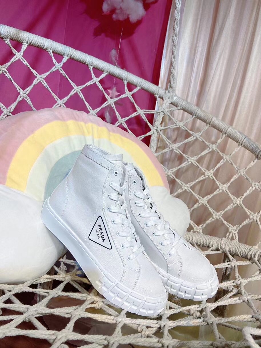 Pra*a white cotton canvas high-top sneakers
