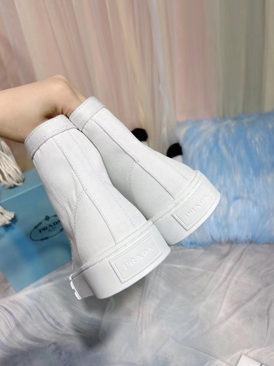 Pra*a white cotton canvas high-top sneakers