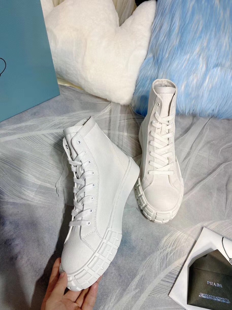 Pra*a white cotton canvas high-top sneakers