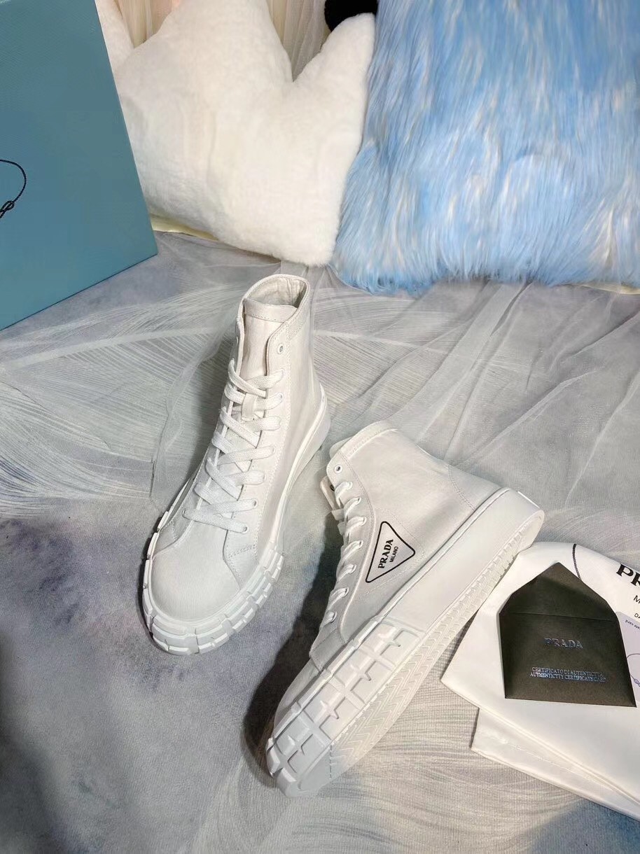 Pra*a white cotton canvas high-top sneakers