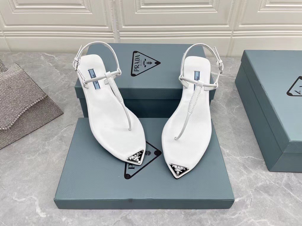 Pra*a thong sandals in white brushed leather
