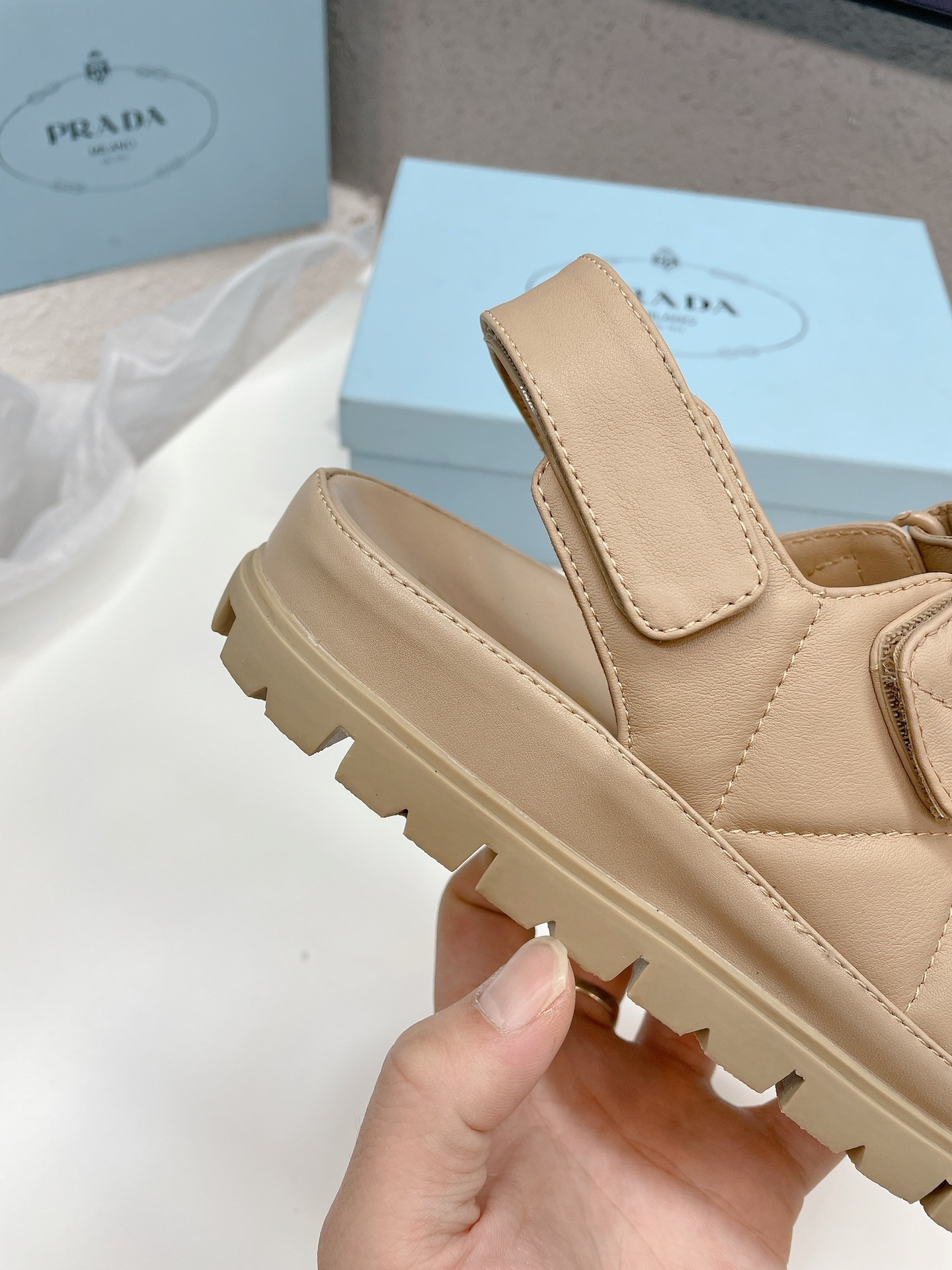 Pra*a padded sandals in beige nappa leather