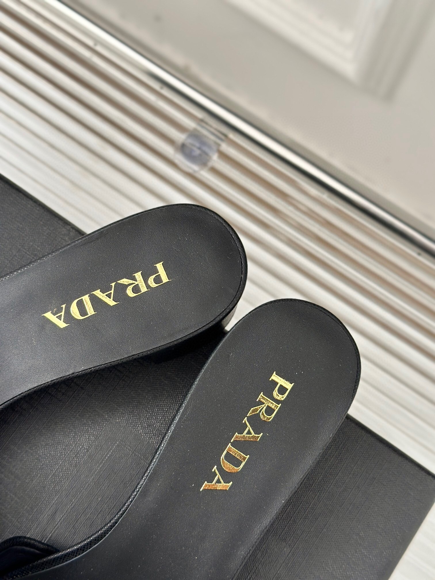 Pra*a heeled sandals 35mm in black saffiano leather