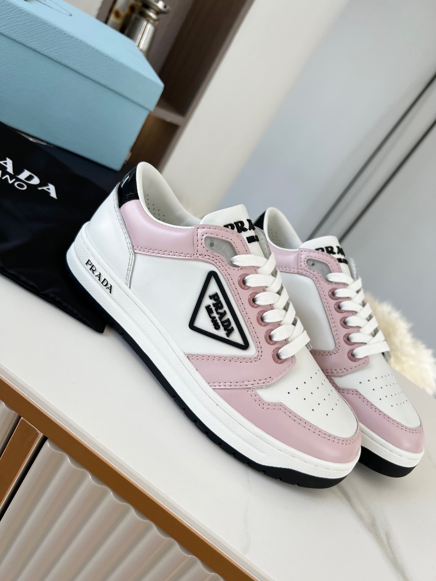 Pra*a district sneakers in white and pink calfskin