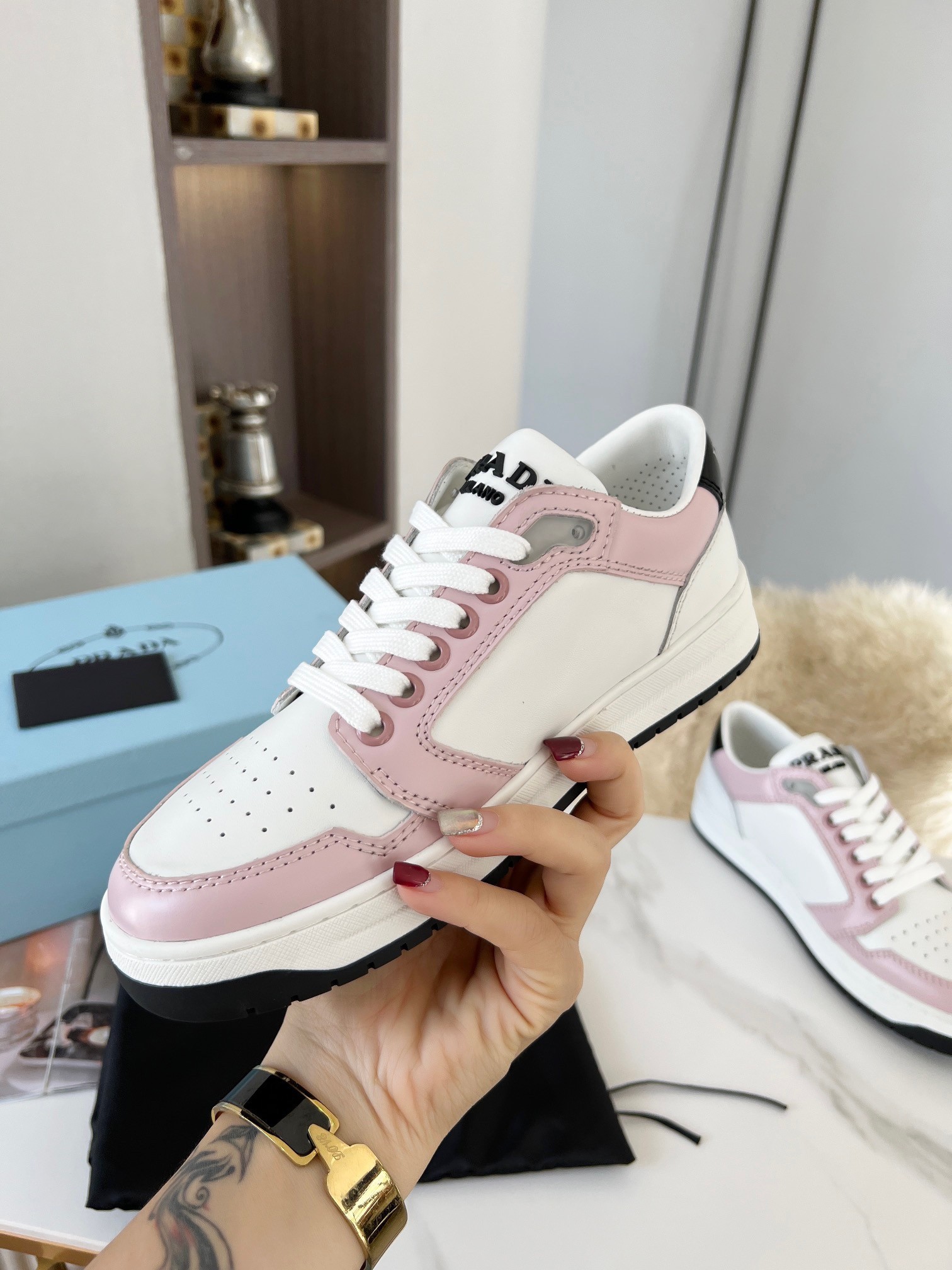 Pra*a district sneakers in white and pink calfskin