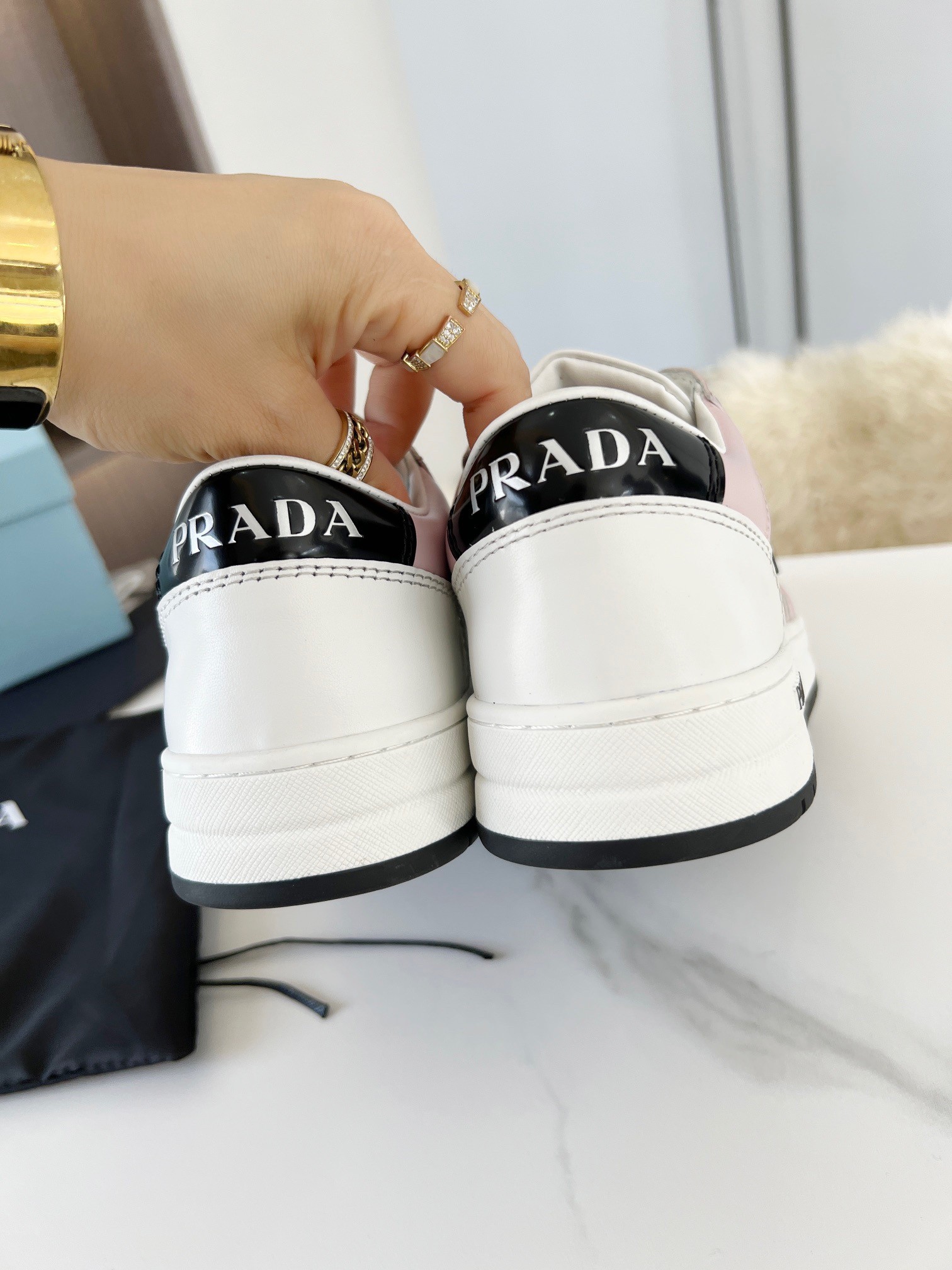 Pra*a district sneakers in white and pink calfskin
