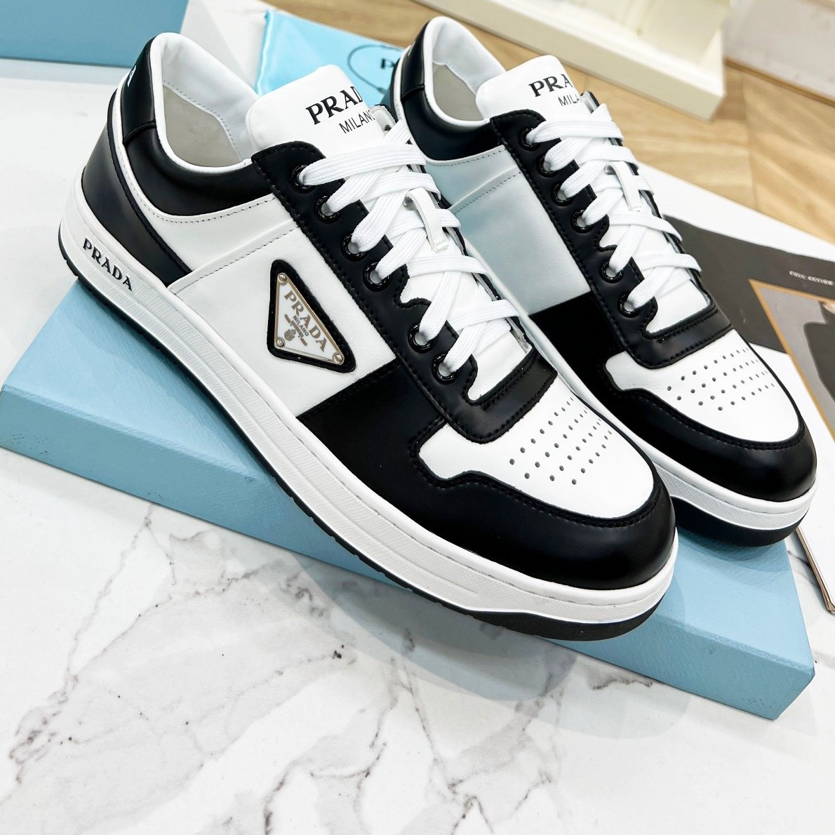 Pra*a downtown sneakers in white and black calfskin