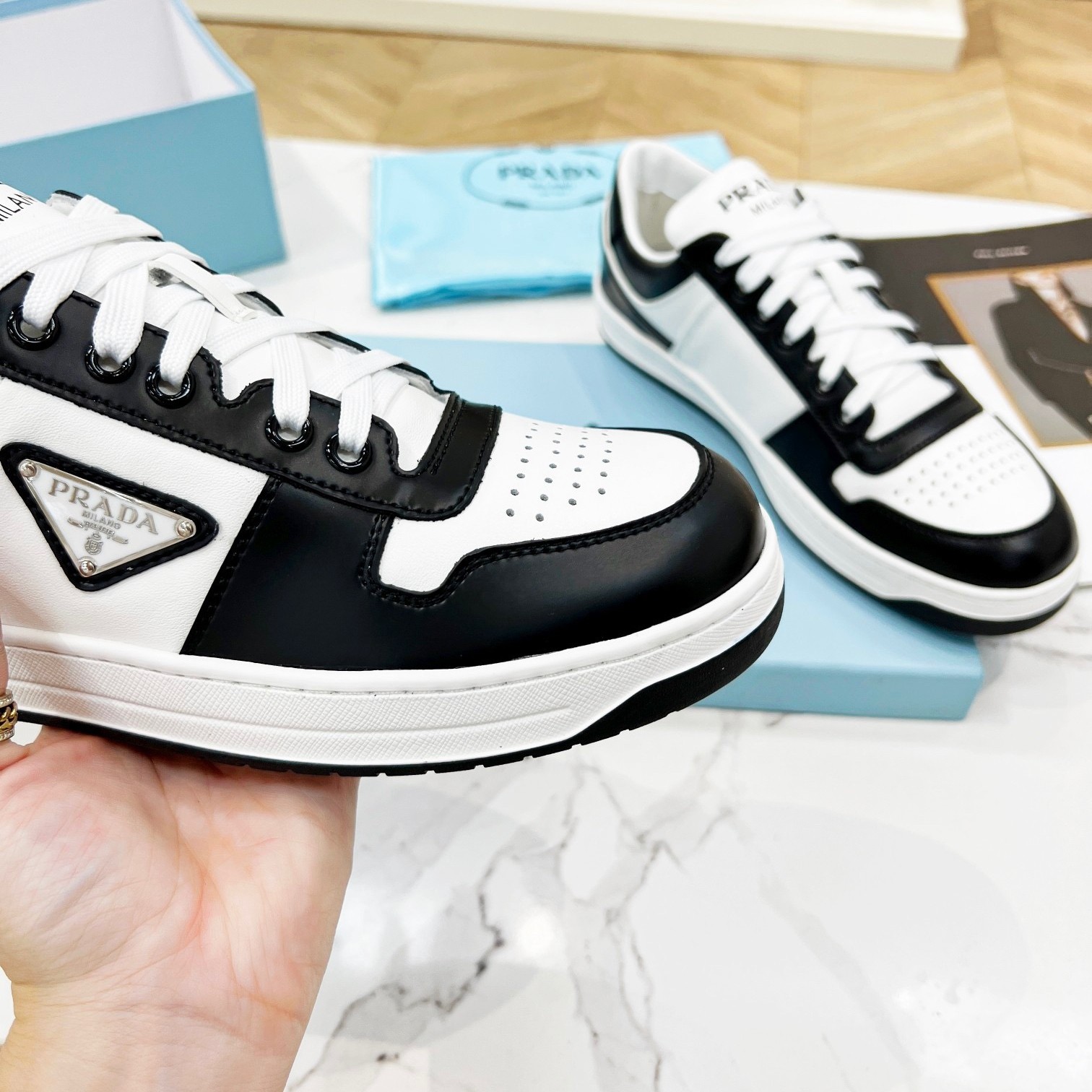 Pra*a downtown sneakers in white and black calfskin